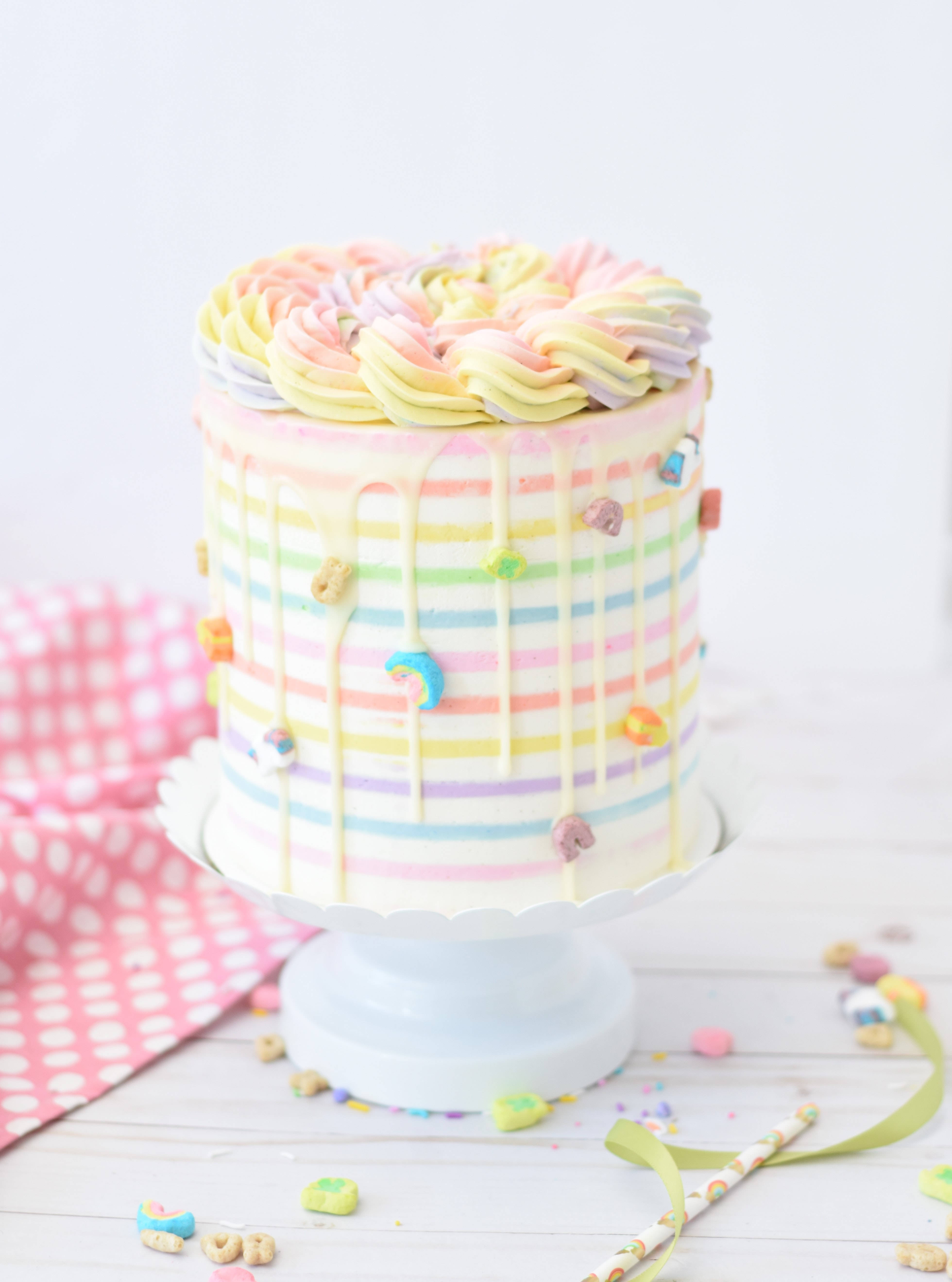 rainbow-striped cake, pastel frosting swirls, colorful cereal pieces, 5K Phone Wallpaper
