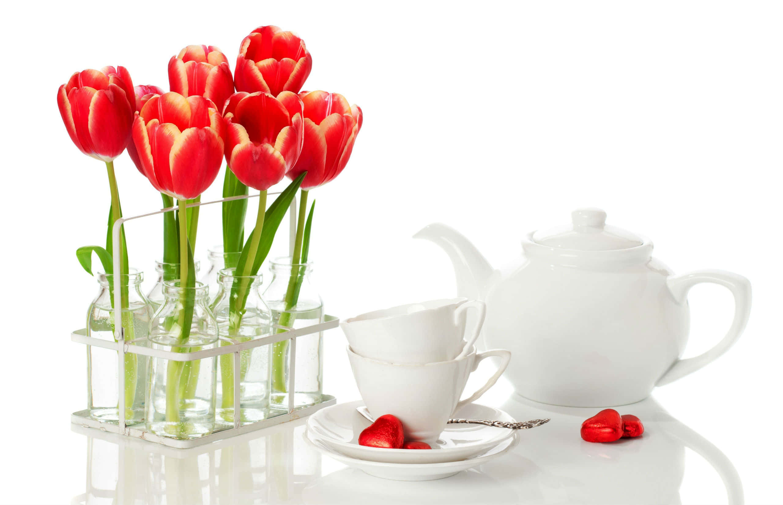 Floral Tea, vibrant red tulips, glass bottles, 2K Desktop Wallpaper