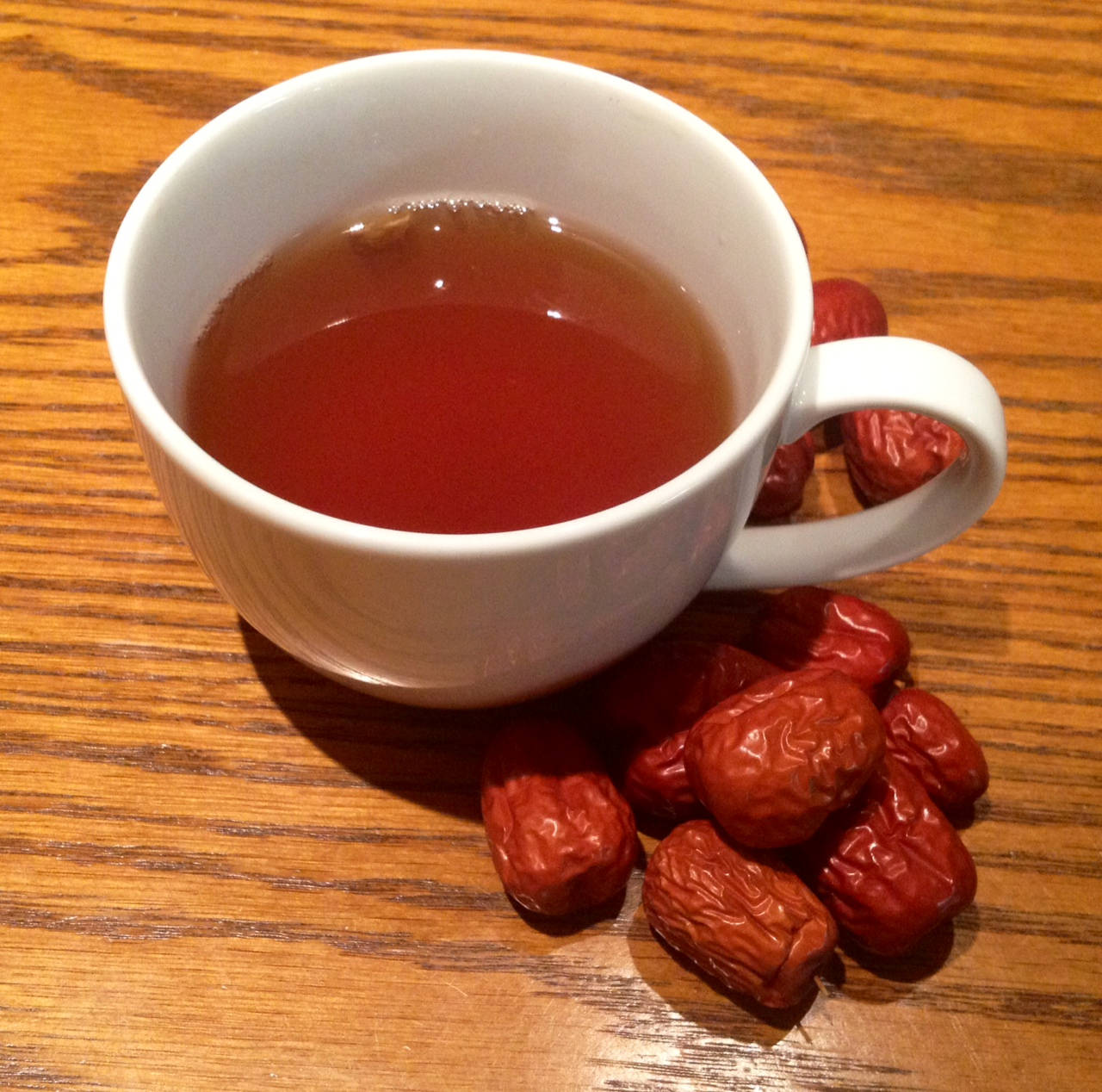 jujube seeds cup of tea, white ceramic cup, amber tea, HD Desktop Wallpaper