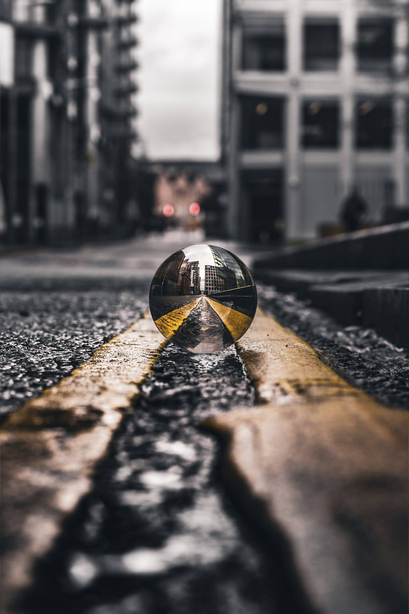 reflective glass sphere, wet urban street, inverted city buildings, Full HD Phone Wallpaper