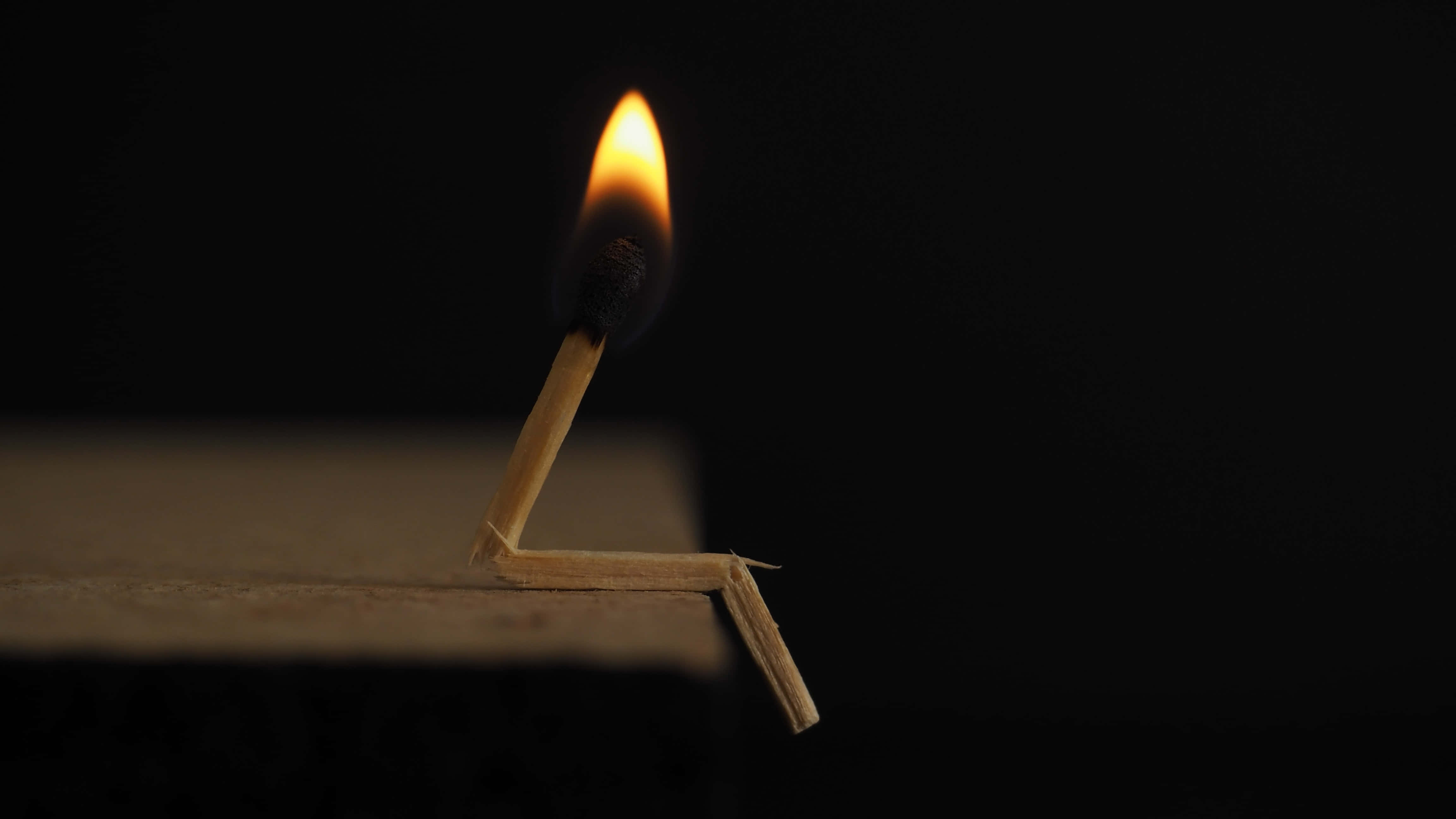 focused fire, lit match, charred head, 4K Desktop Wallpaper