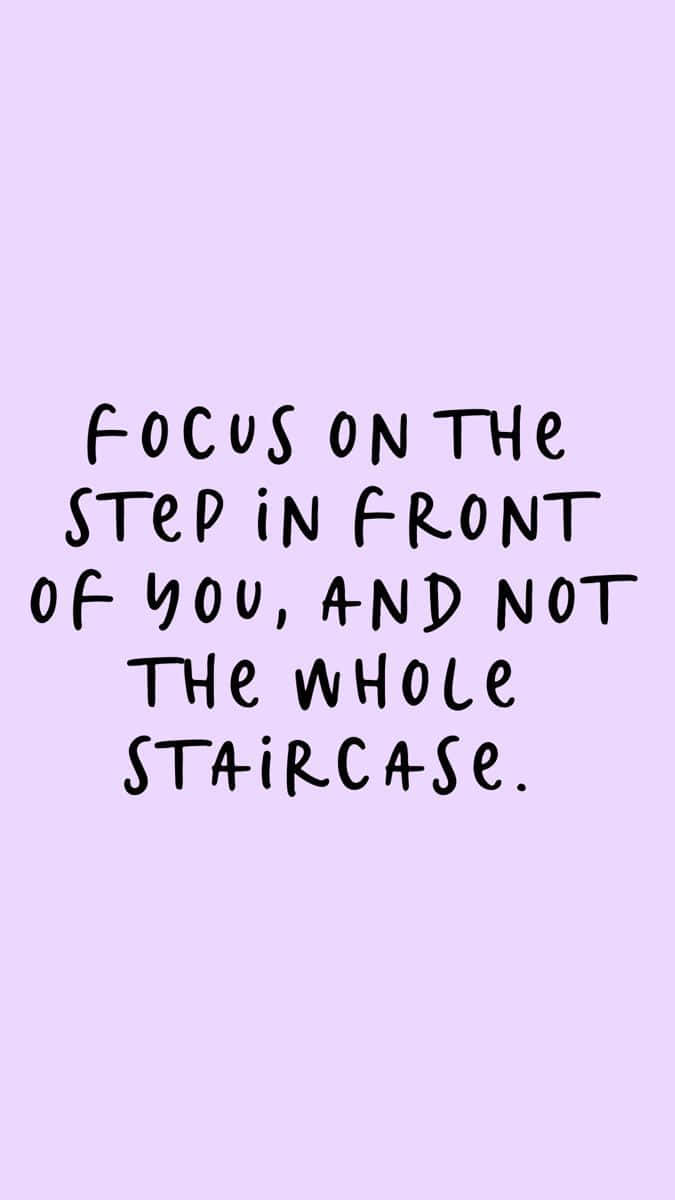 Focused Quote, bold black handwritten text, soft lavender background, SD Phone Wallpaper