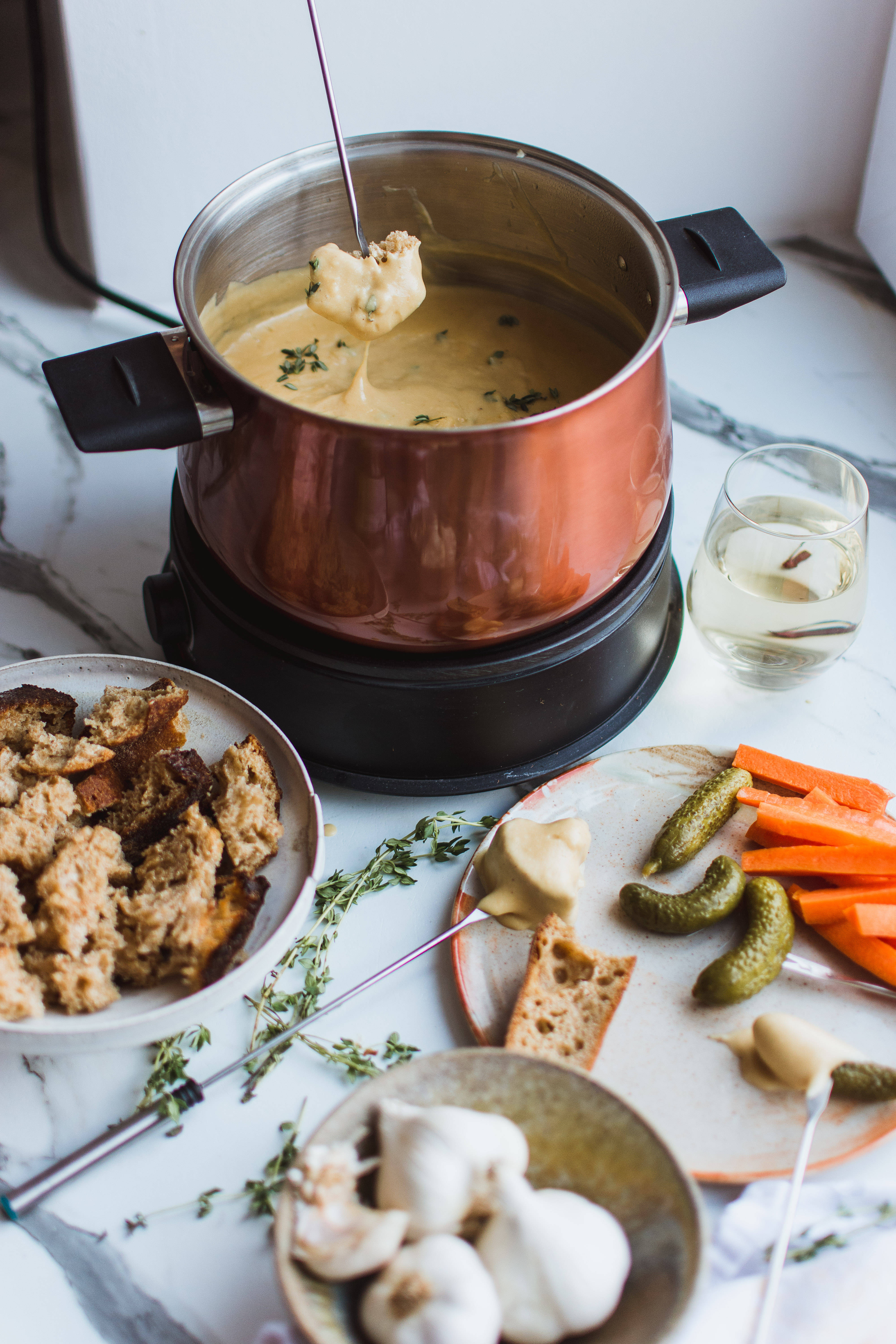 copper fondue pot, creamy cheese sauce, marble countertop, 5K Phone Wallpaper
