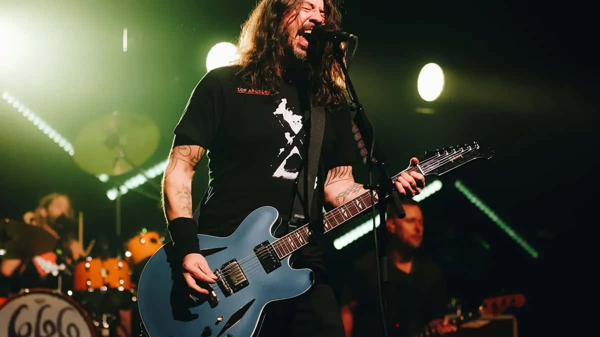 Foo Fighters, blue electric guitar, green stage lights, SD Desktop Wallpaper