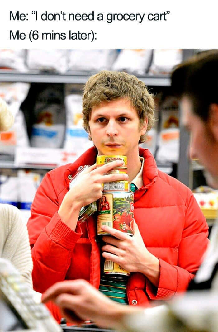 red jacket, tall stack of canned goods, grocery checkout, SD Phone Wallpaper