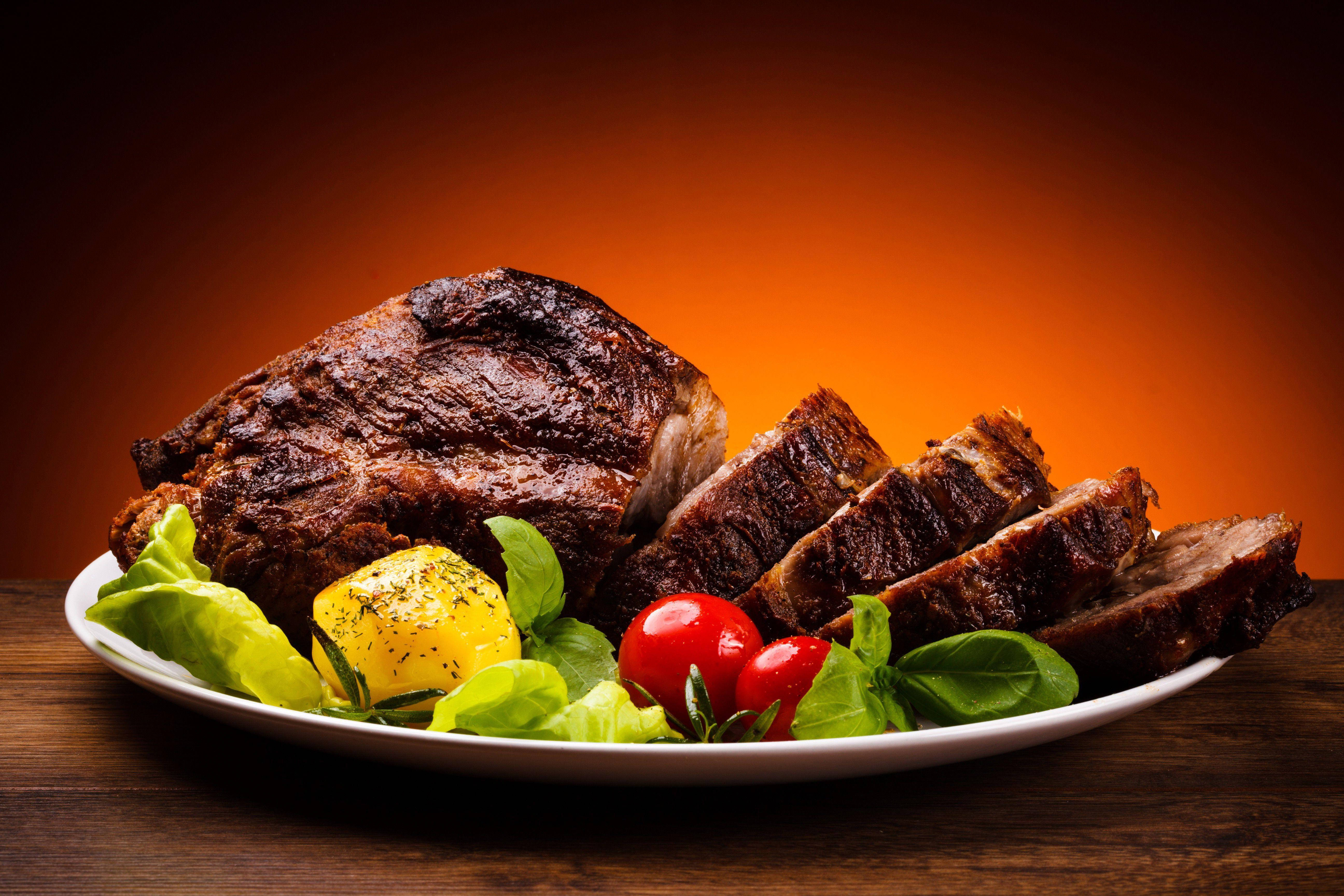 roast beef, white plate, warm orange gradient background, 5K Desktop Wallpaper