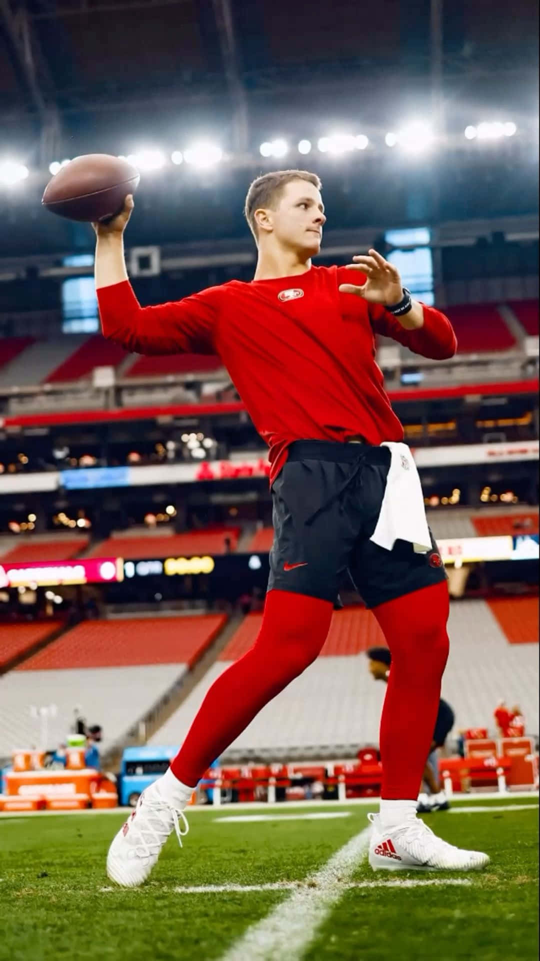 quarterback, red gear, brightly lit stadium field, Full HD Phone Wallpaper