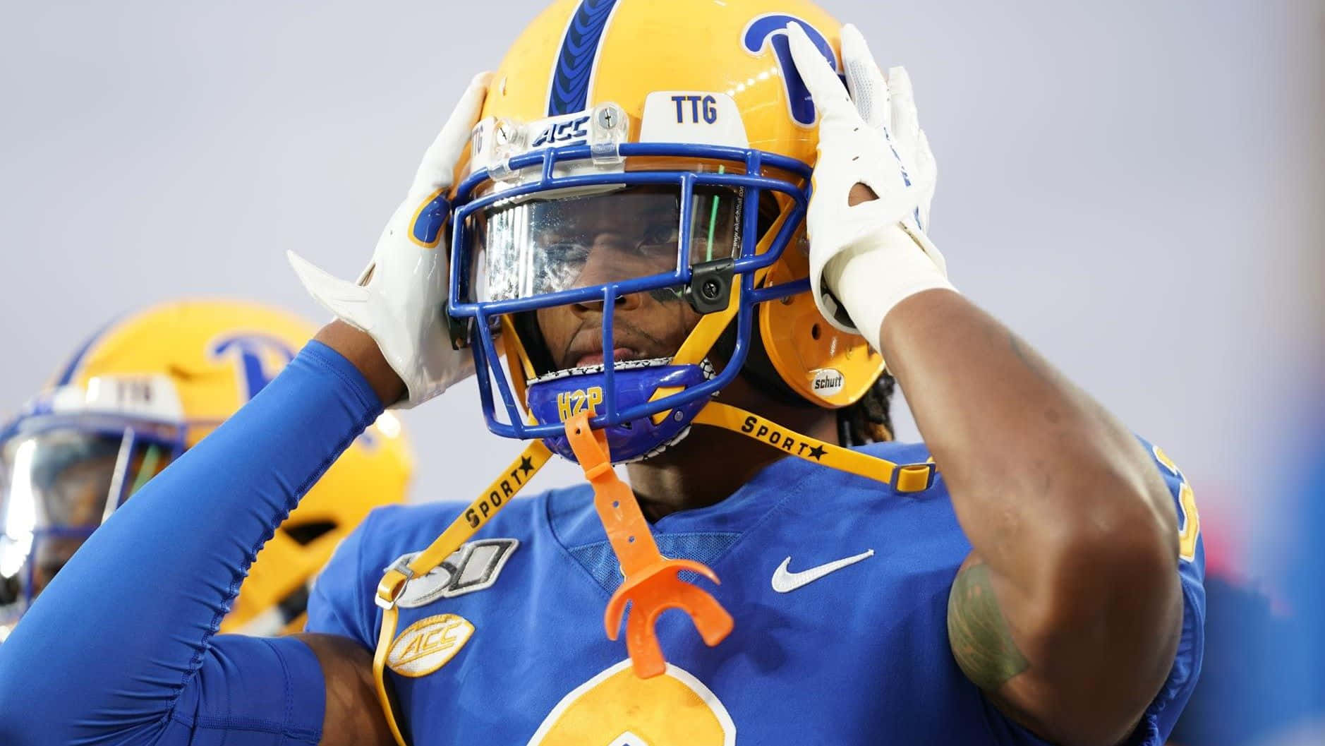football player, blue and gold gear, helmet, HD Desktop Wallpaper