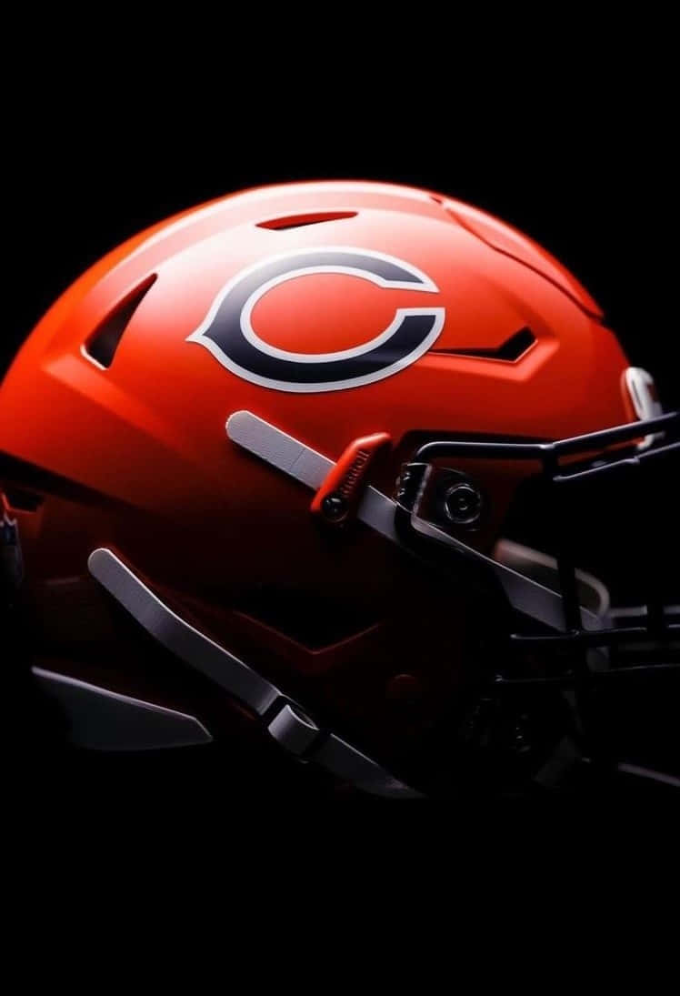 glossy orange football helmet, white and black 'C' logo, black background, SD Phone Wallpaper