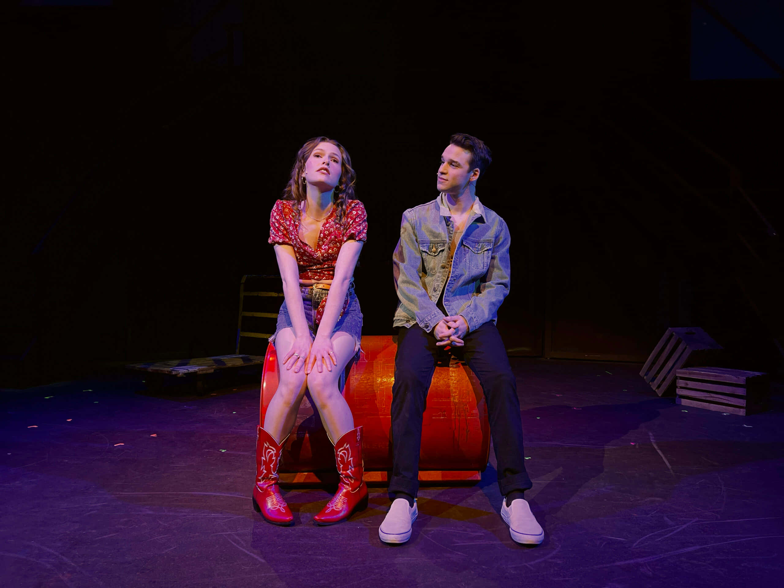 Footloose, glowing orange barrel, dark stage, 2K Desktop Wallpaper