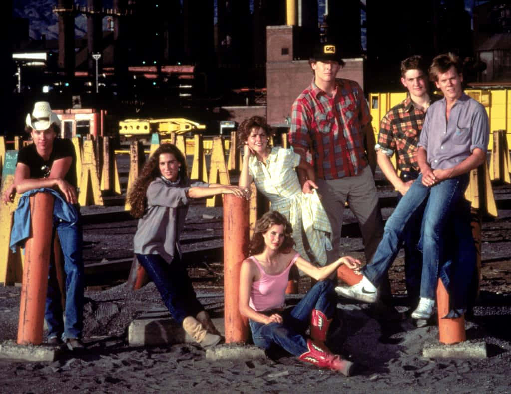 Footloose, cast group pose, orange construction barrels, SD Desktop Wallpaper