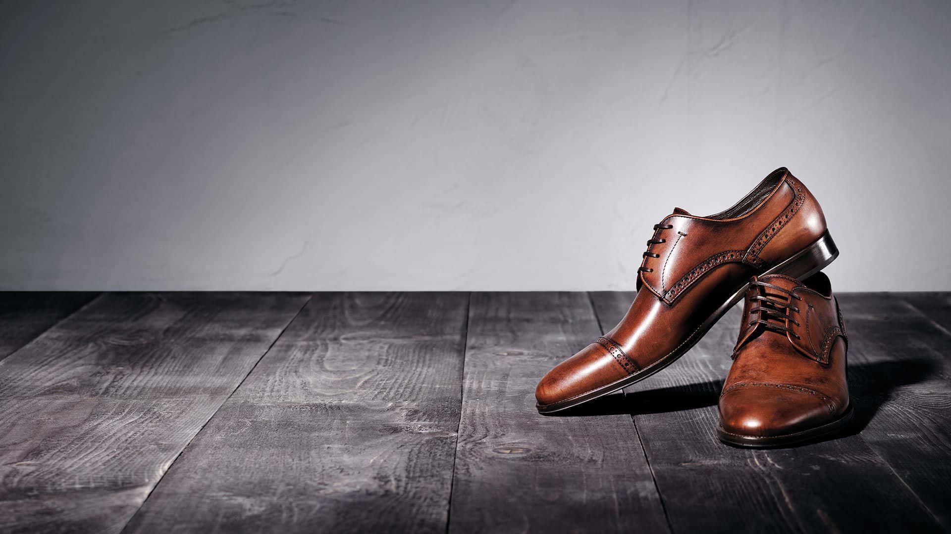polished brown leather dress shoes, dark wooden planks, muted gray wall, Full HD Desktop Wallpaper
