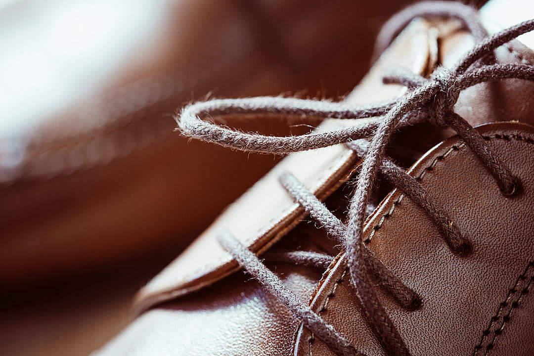 brown leather shoe, frayed laces, visible stitching, SD Desktop Wallpaper