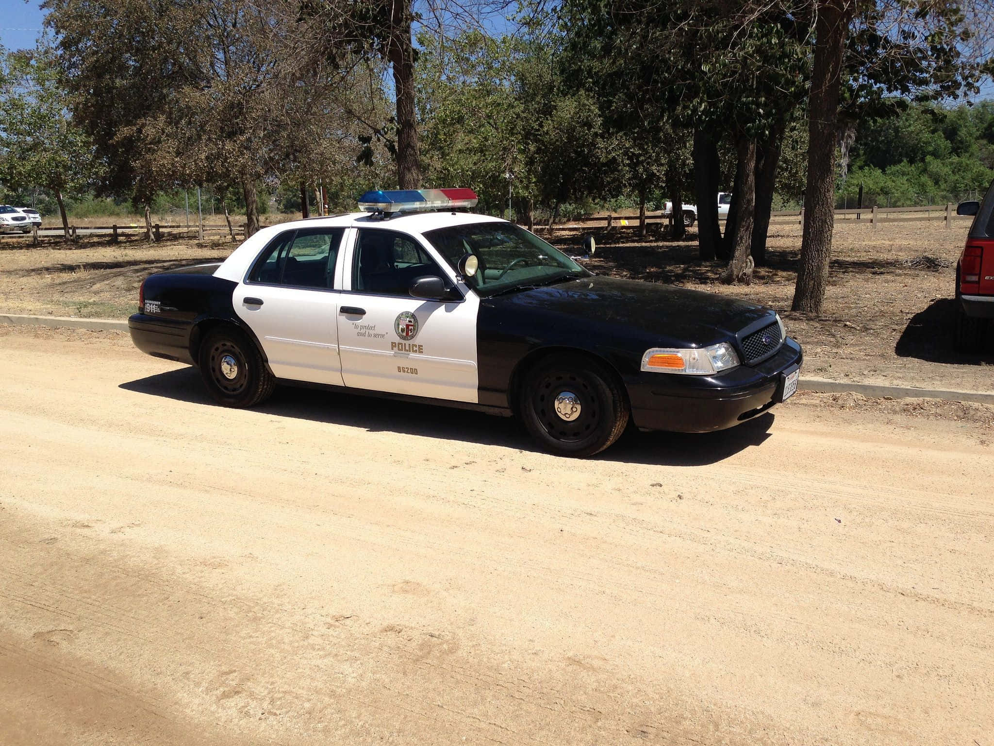 Ford Crown Victoria, black and white police car, blue and red lights, Full HD Desktop Wallpaper