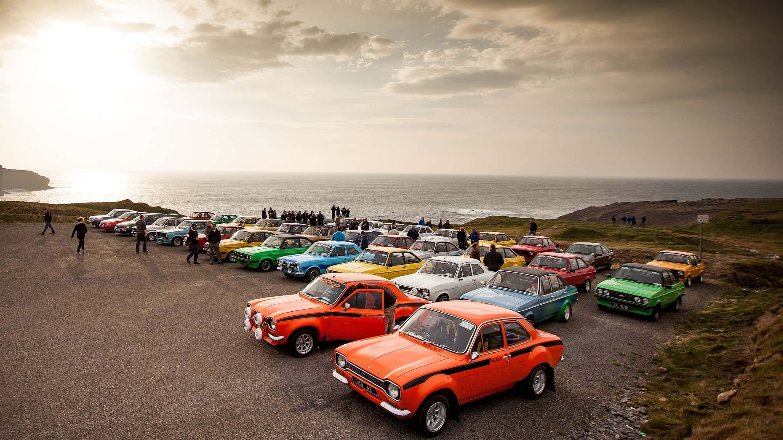 Ford Escort, coastal cliff, ocean, 2K Desktop Wallpaper