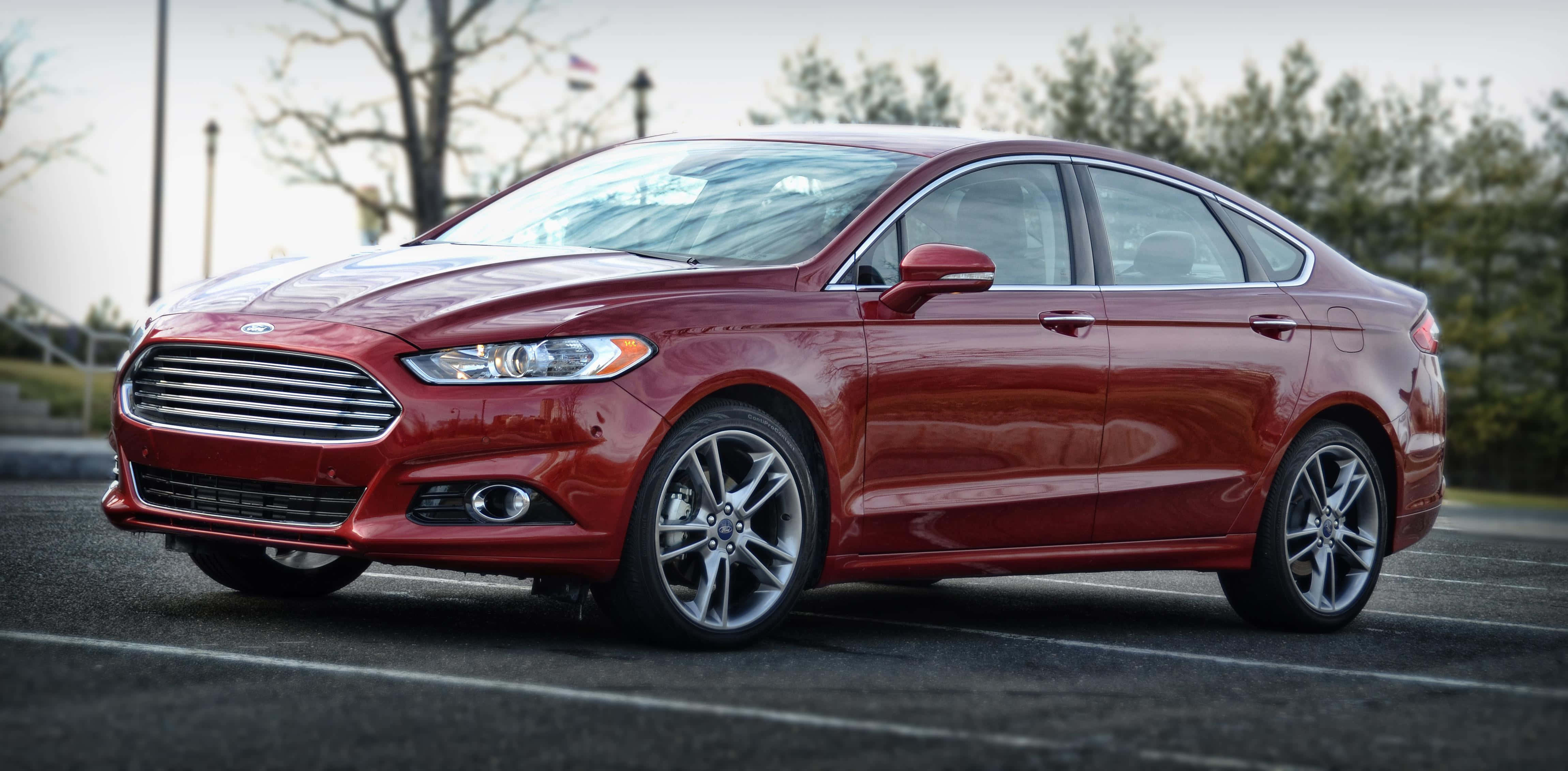 Ford Fusion, glossy red, urban setting, 4K Desktop Wallpaper