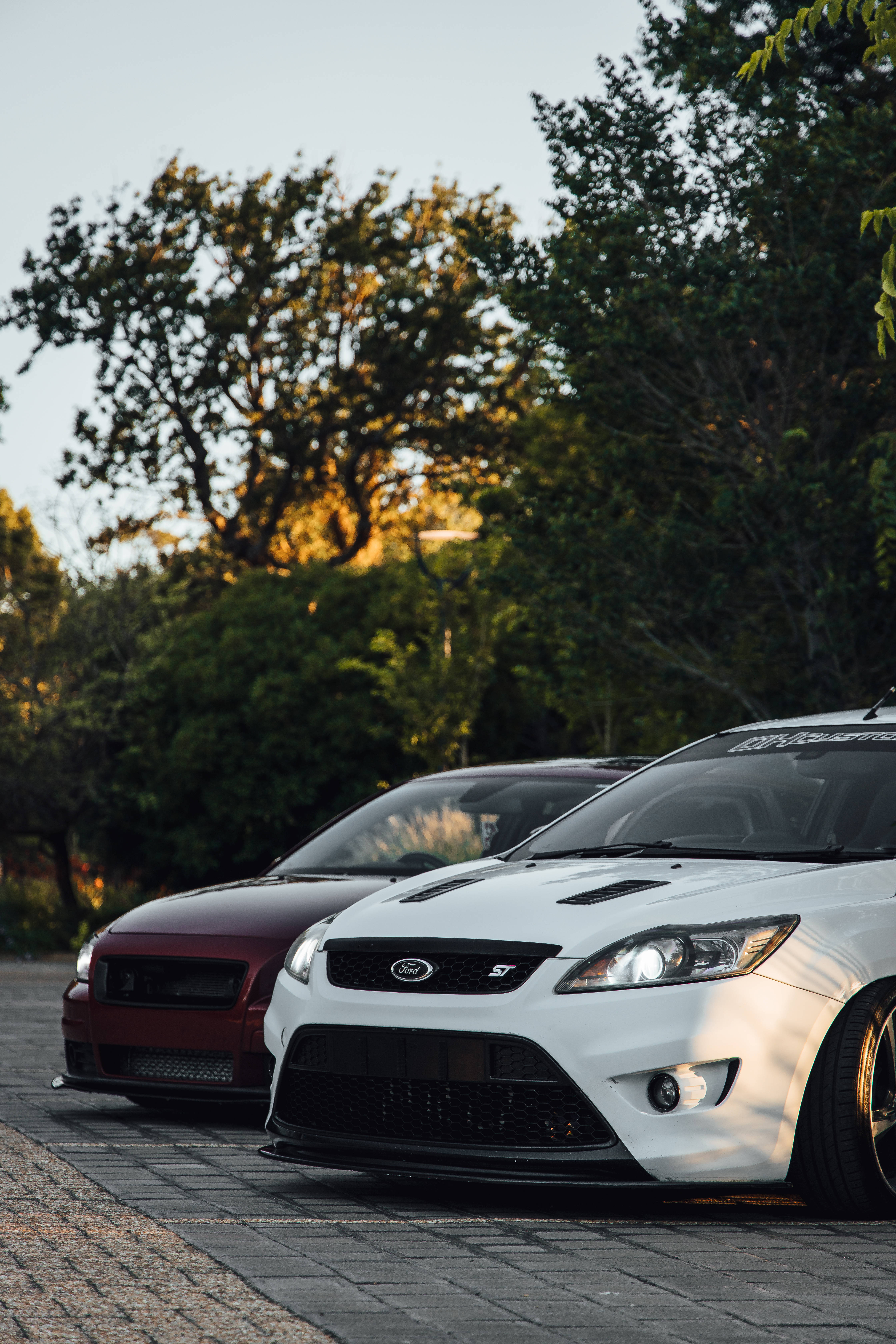 Ford iPhone, sports cars, cobblestone street, 5K Phone Wallpaper