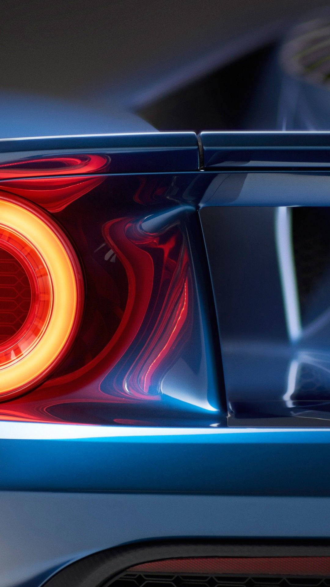 Ford iPhone, glowing red circular taillight, sleek blue sports car, Full HD Phone Wallpaper