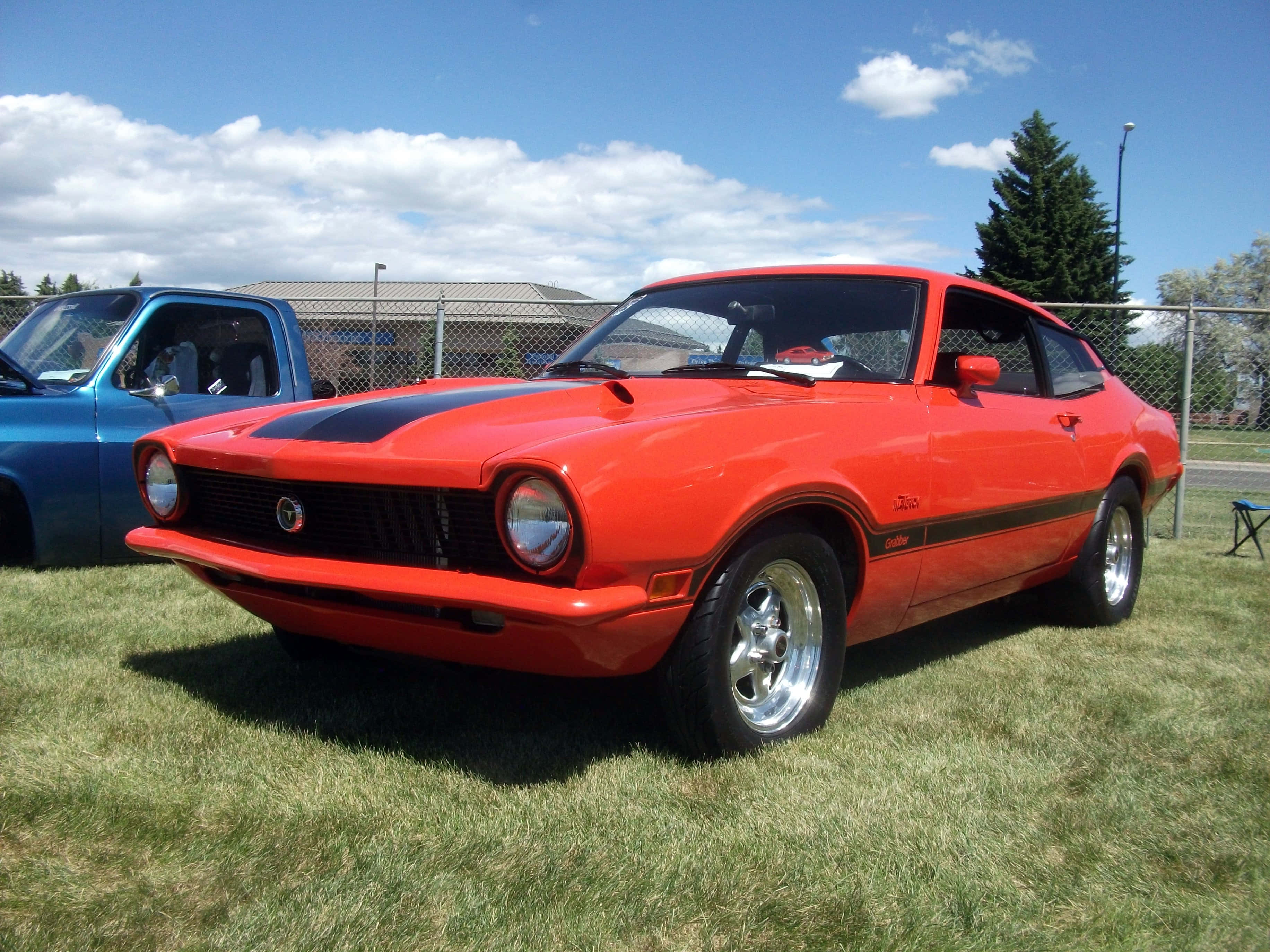Ford Maverick, vibrant red, black racing stripes, 2K Desktop Wallpaper