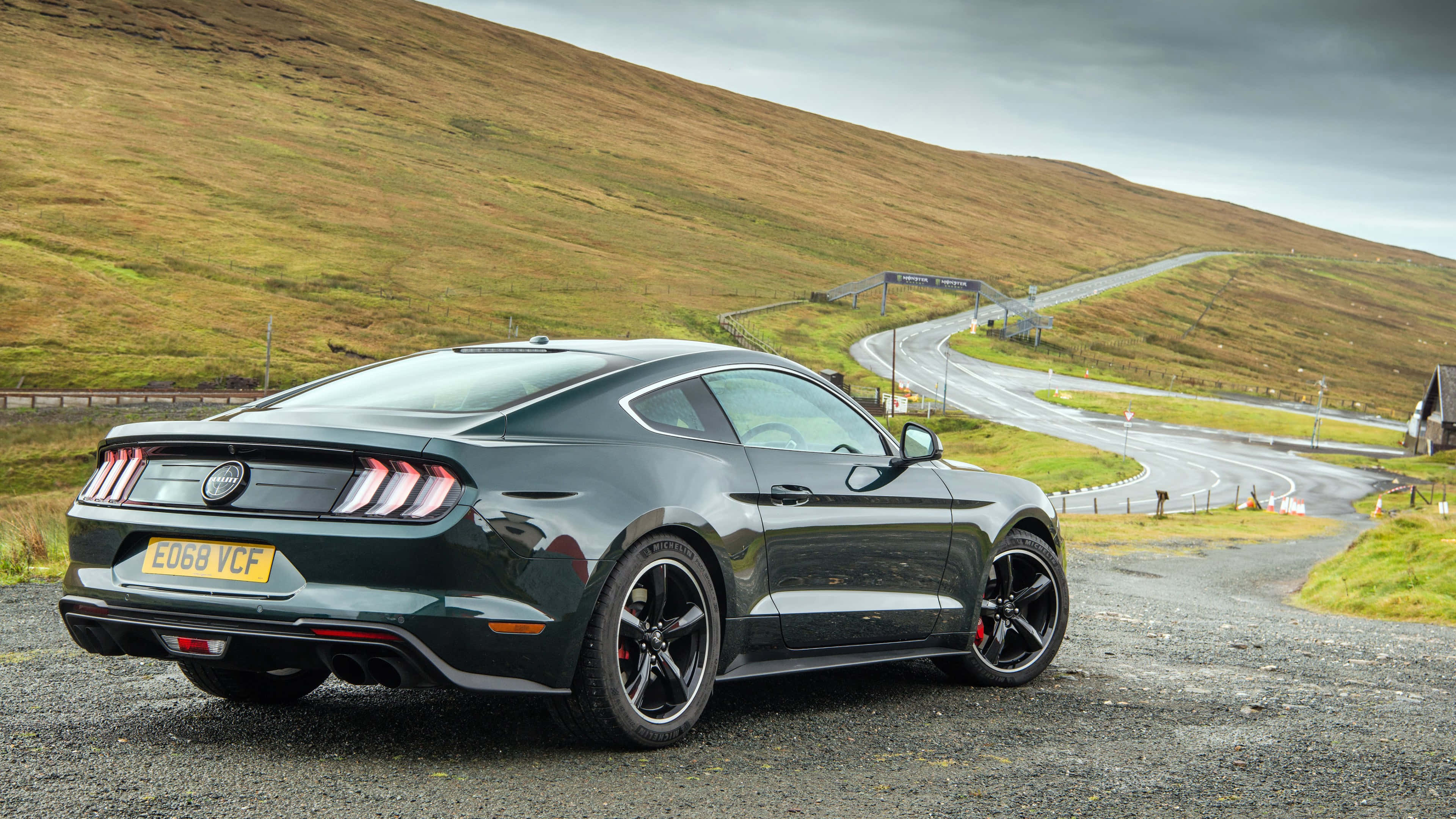 Ford Mustang Bullitt, dark green, gravel road, 4K Desktop Wallpaper