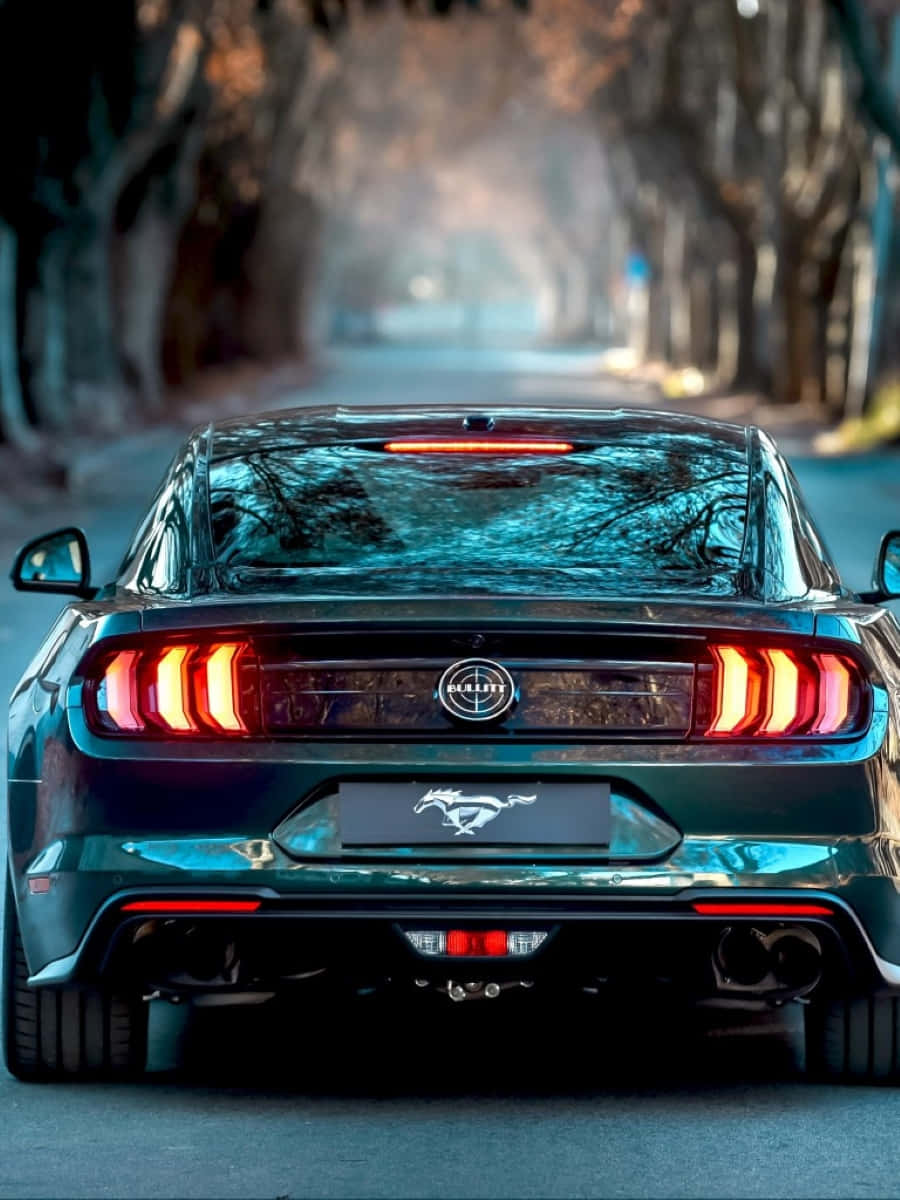 Ford Mustang Bullitt, dark green, glowing red taillights, SD Phone Wallpaper