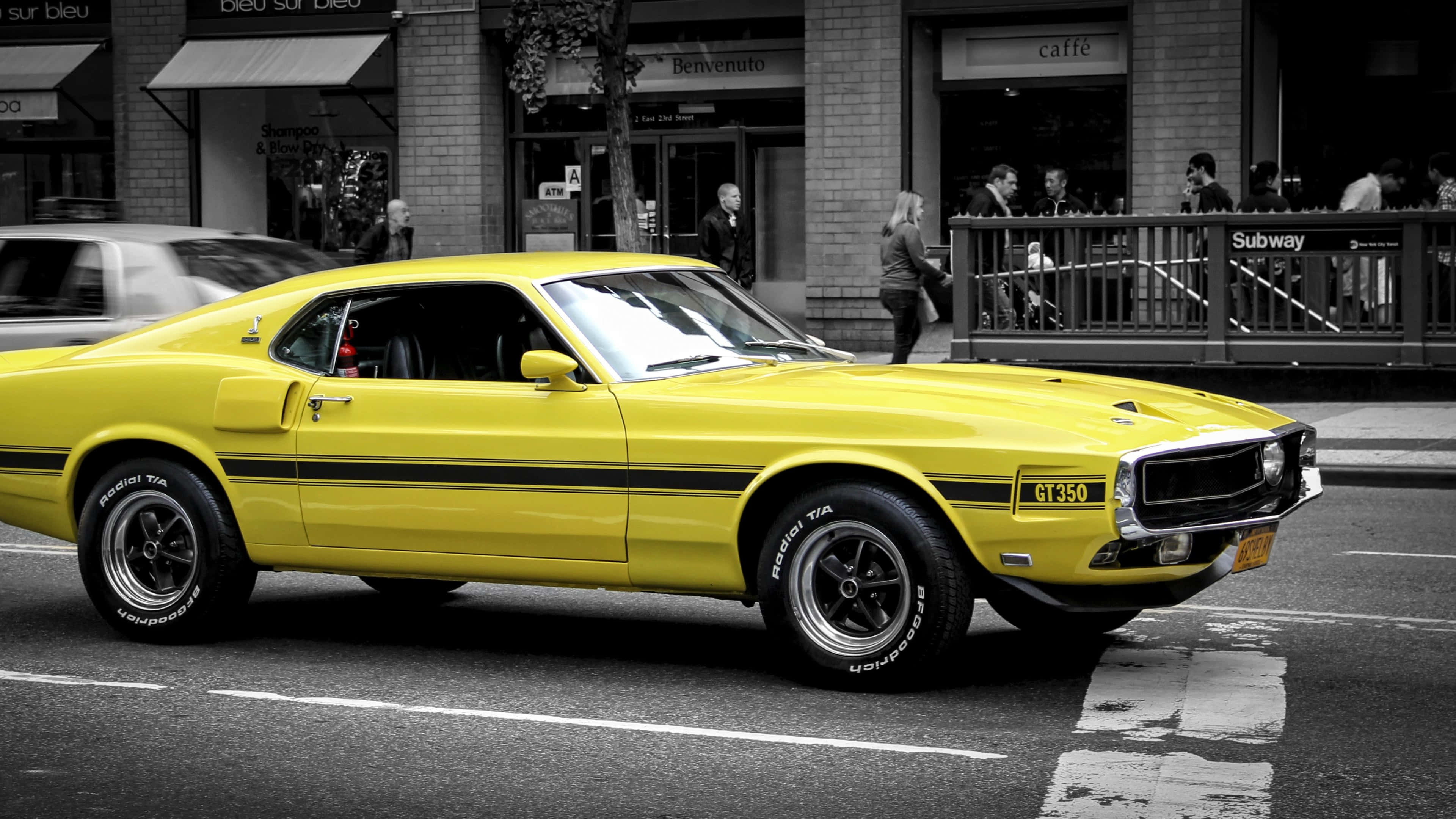 Yellow Ford Mustang, classic muscle car, bustling city street, 4K Desktop Wallpaper