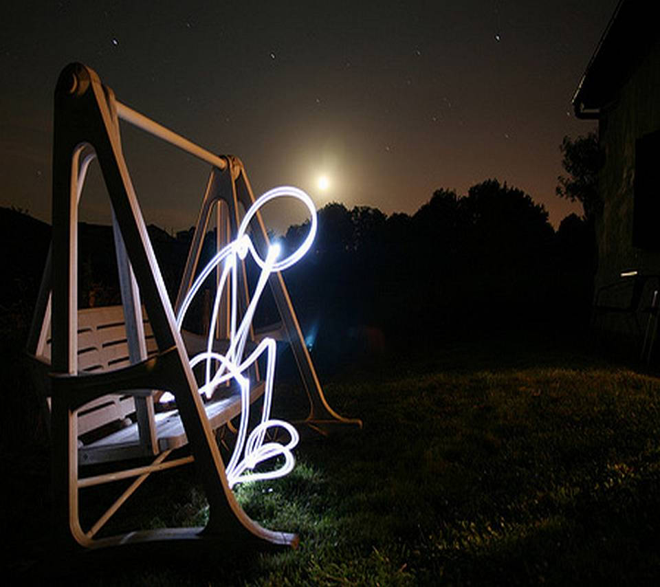Forever Alone, glowing light-painted swirl, wooden swing, SD Desktop Wallpaper