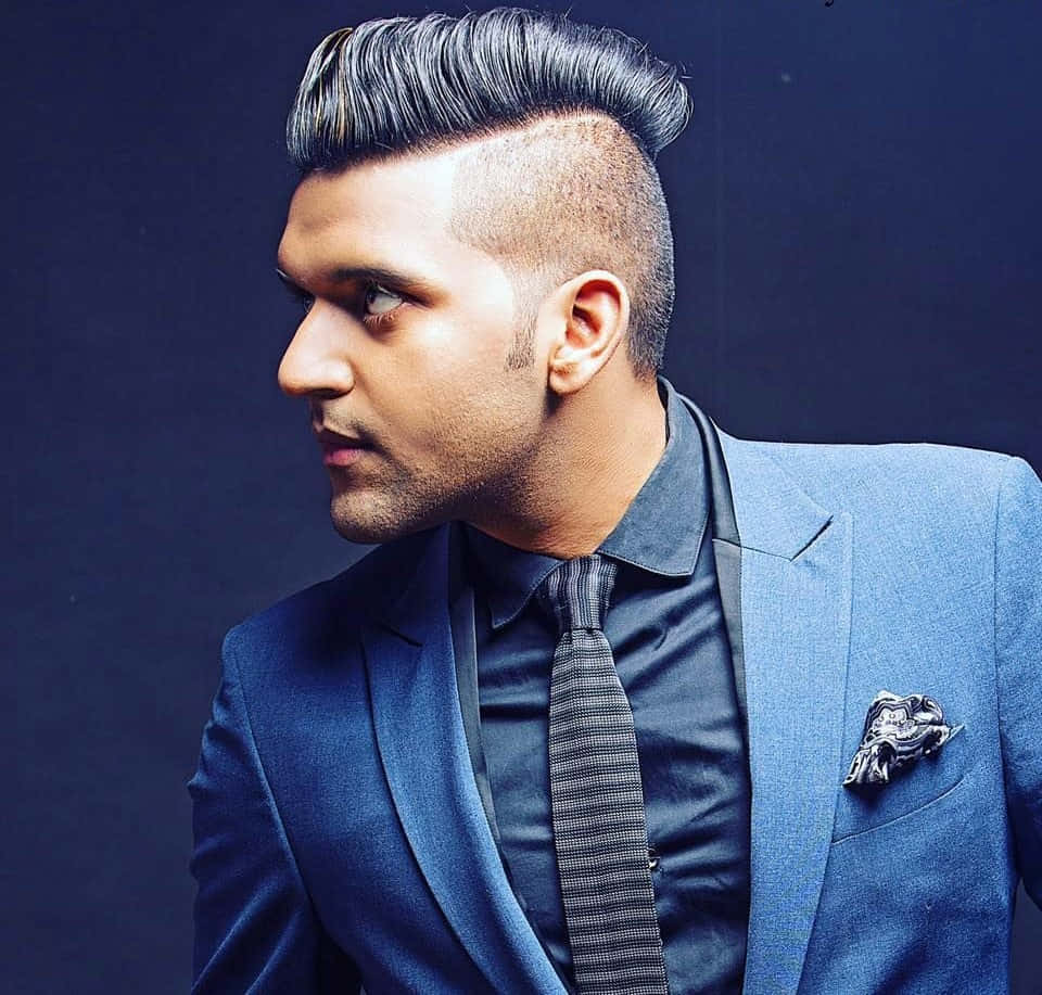 pompadour haircut, sleek blue suit, dark backdrop, SD Desktop Wallpaper