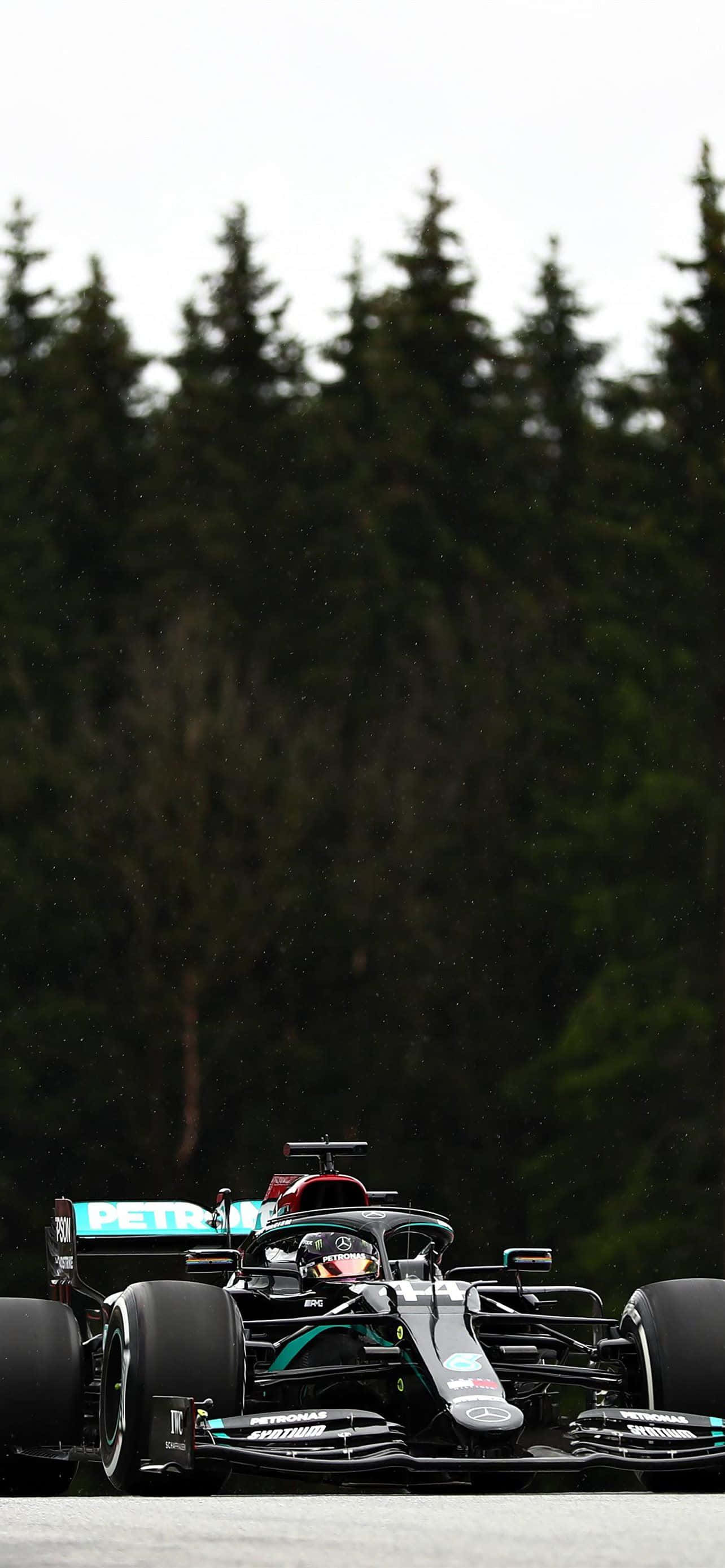 Formula 1, black and teal Formula 1 car, wet track, 2K Phone Wallpaper