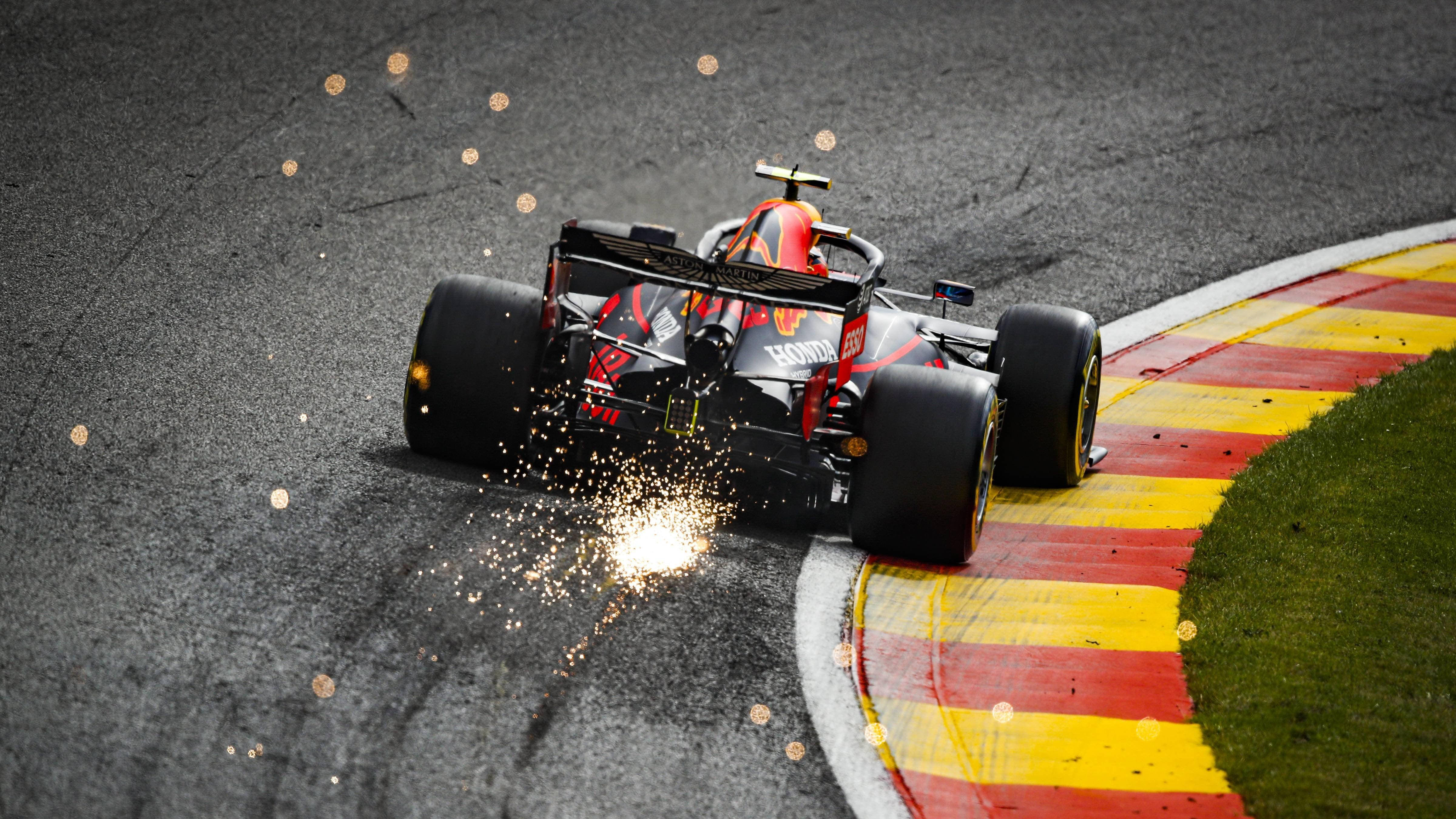 Formula 1, red and black Formula 1 car, wet turn, 4K Desktop Wallpaper