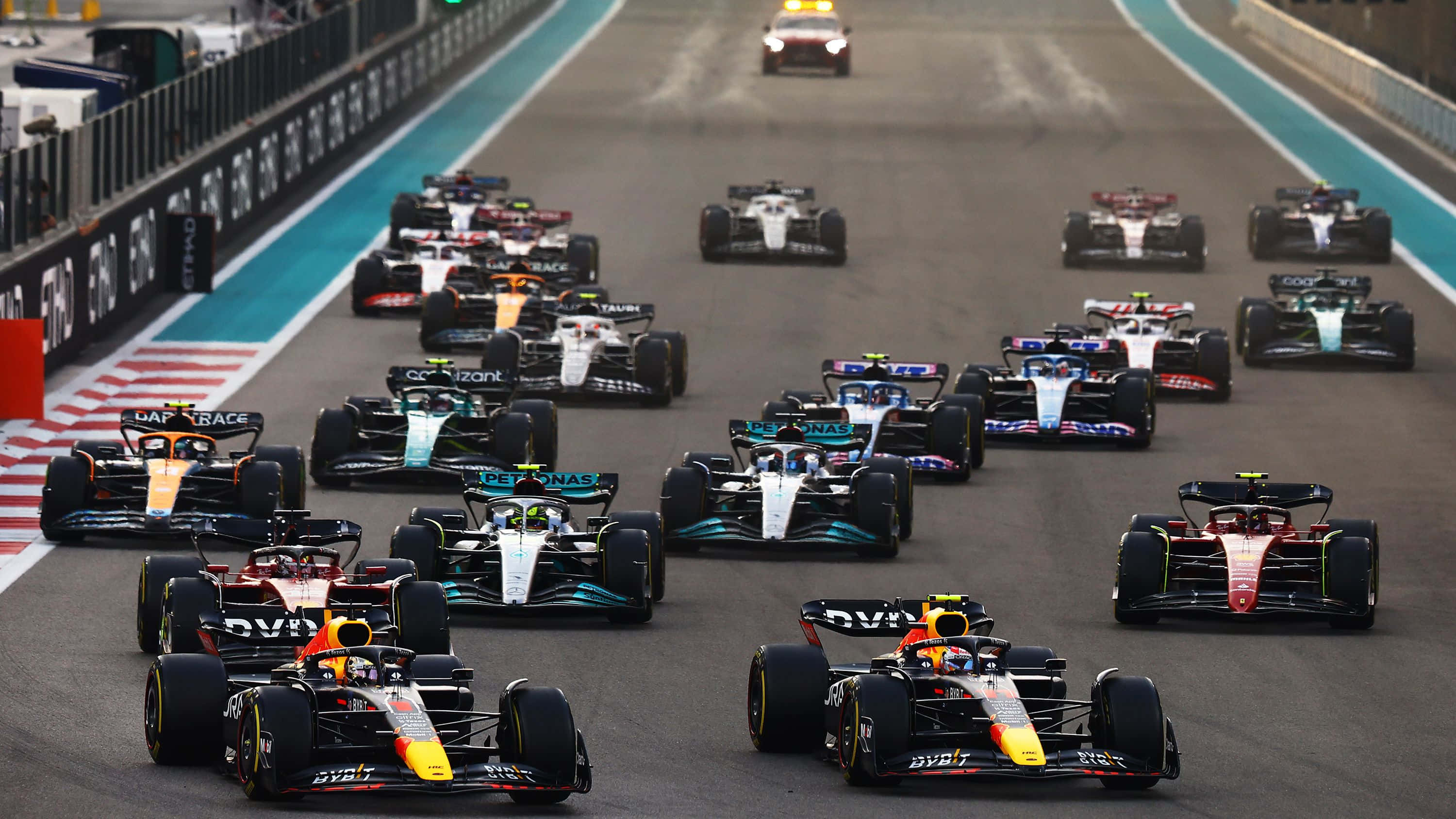 Formula 1, race cars, wet track, 2K Desktop Wallpaper