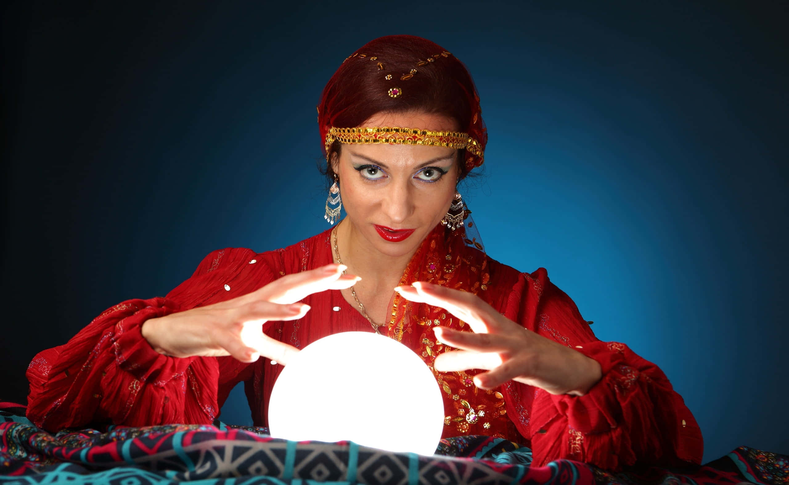 Fortune Teller, glowing crystal ball, ornate red attire, 2K Desktop Wallpaper