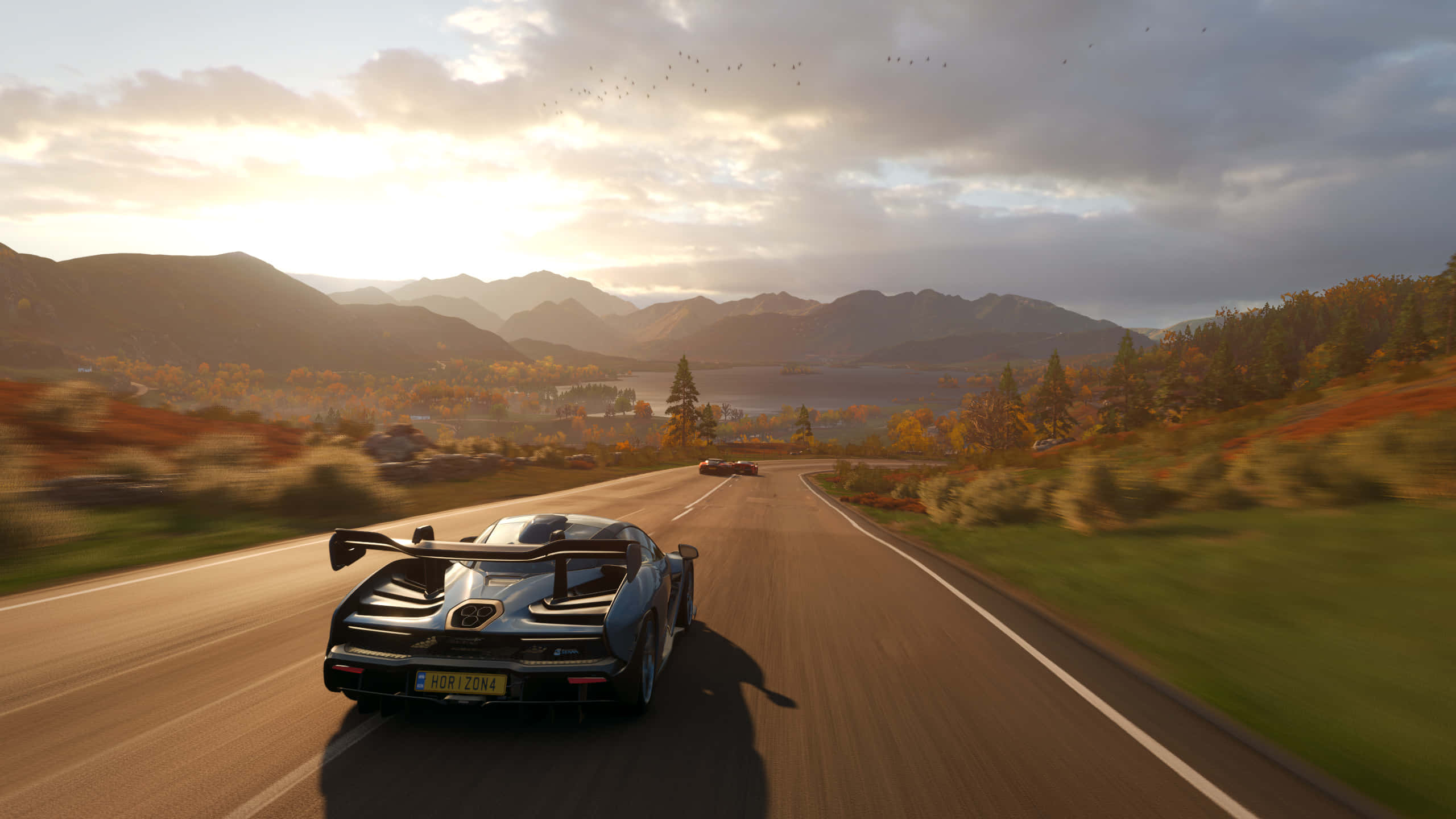 Forza Horizon 4, sleek blue sports car, winding mountain road, 2K Desktop Wallpaper