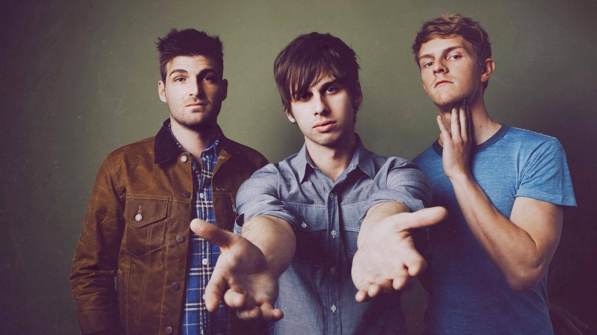 Foster the People, muted green backdrop, dramatic lighting, Full HD Desktop Wallpaper