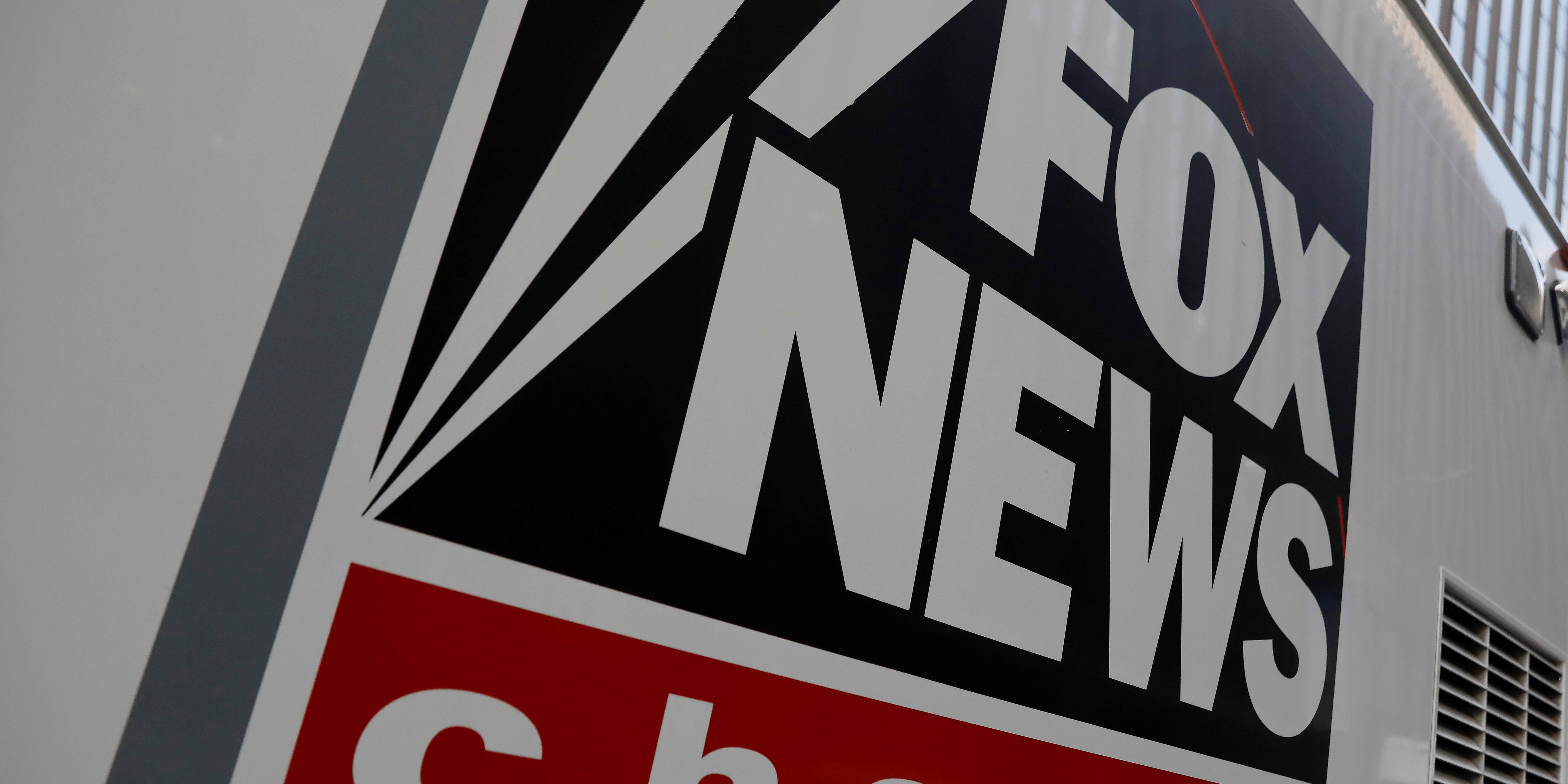 Fox News, white broadcast truck, bold black white and red branding, 5K Desktop Wallpaper