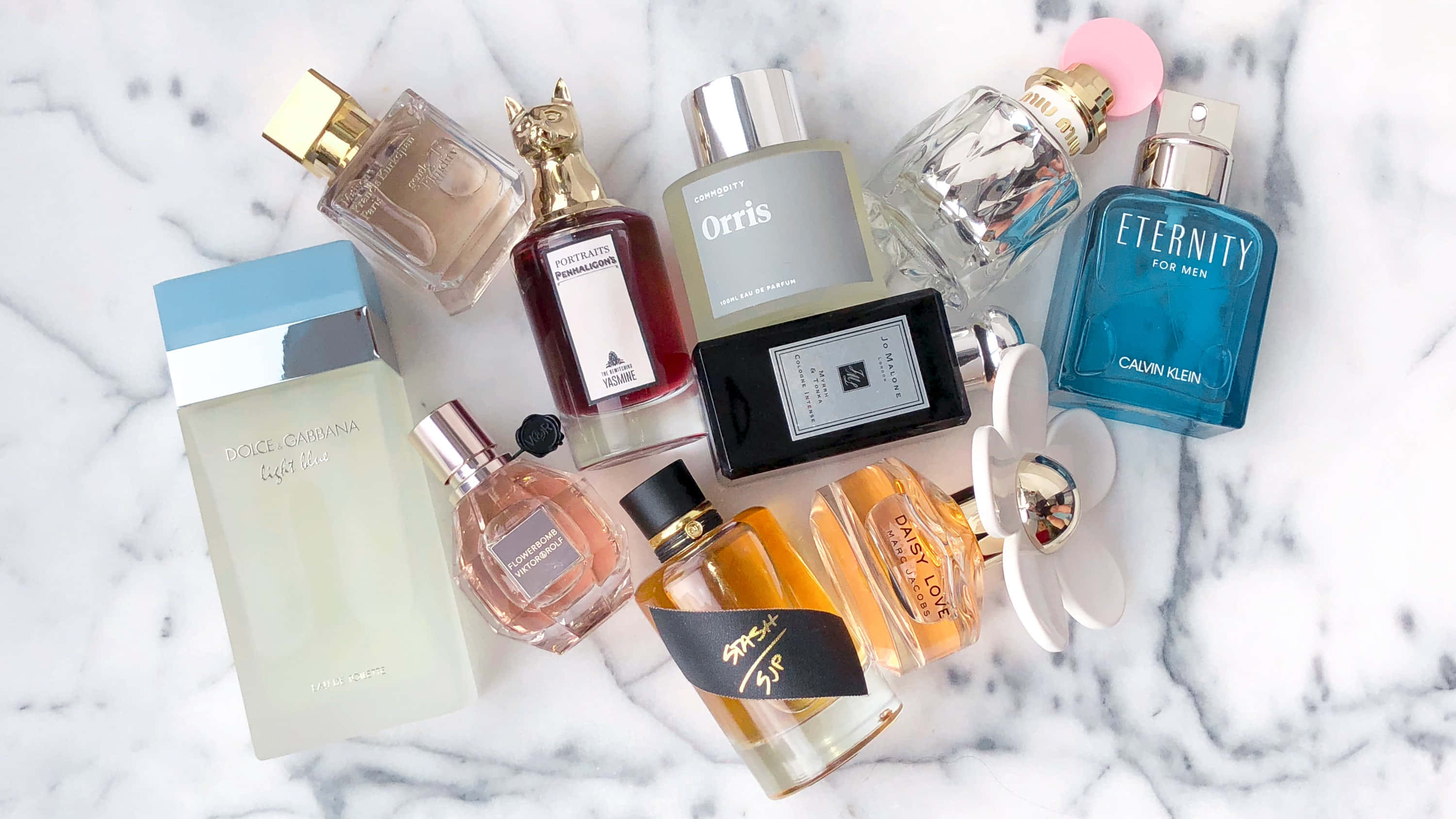 fragrance 3000, white marble surface, gold accents, 2K Desktop Wallpaper
