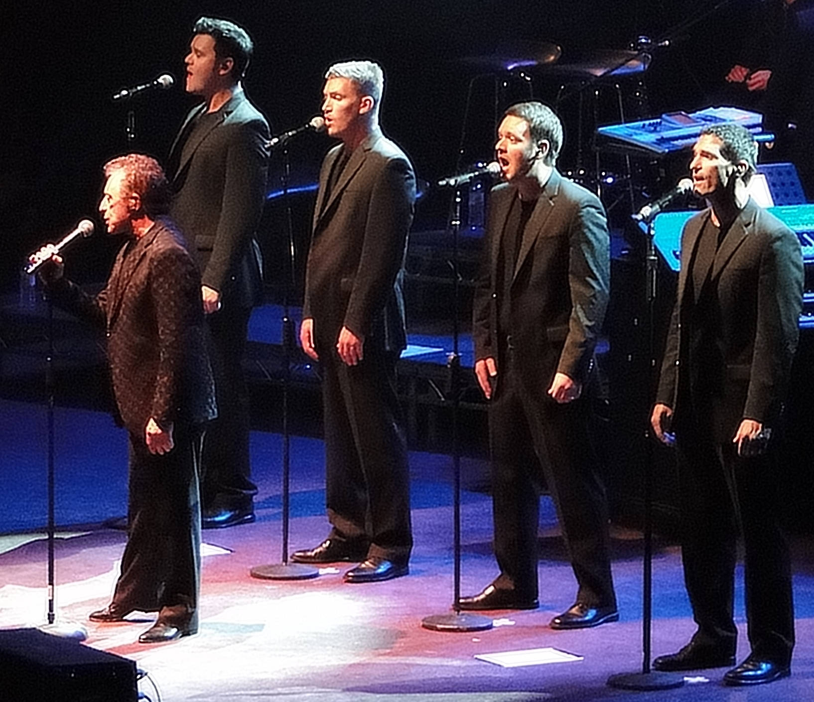 Frankie Valli And The Four Seasons, dark suits, dimly lit stage, HD Desktop Wallpaper
