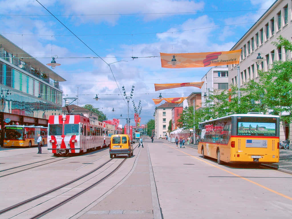 Frauenfeld, red and white trams, yellow buses, SD Desktop Wallpaper