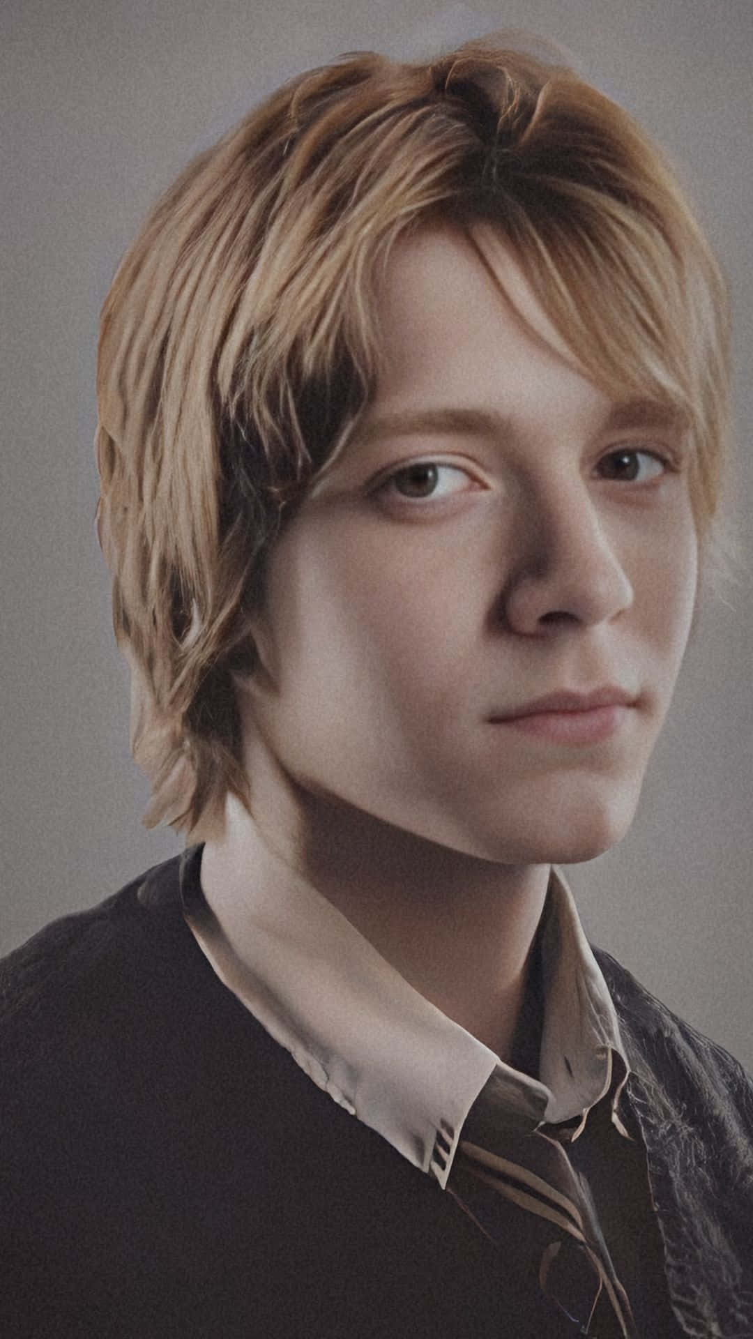 Fred Weasley, tousled blonde hair, dark sweater, Full HD Phone Wallpaper
