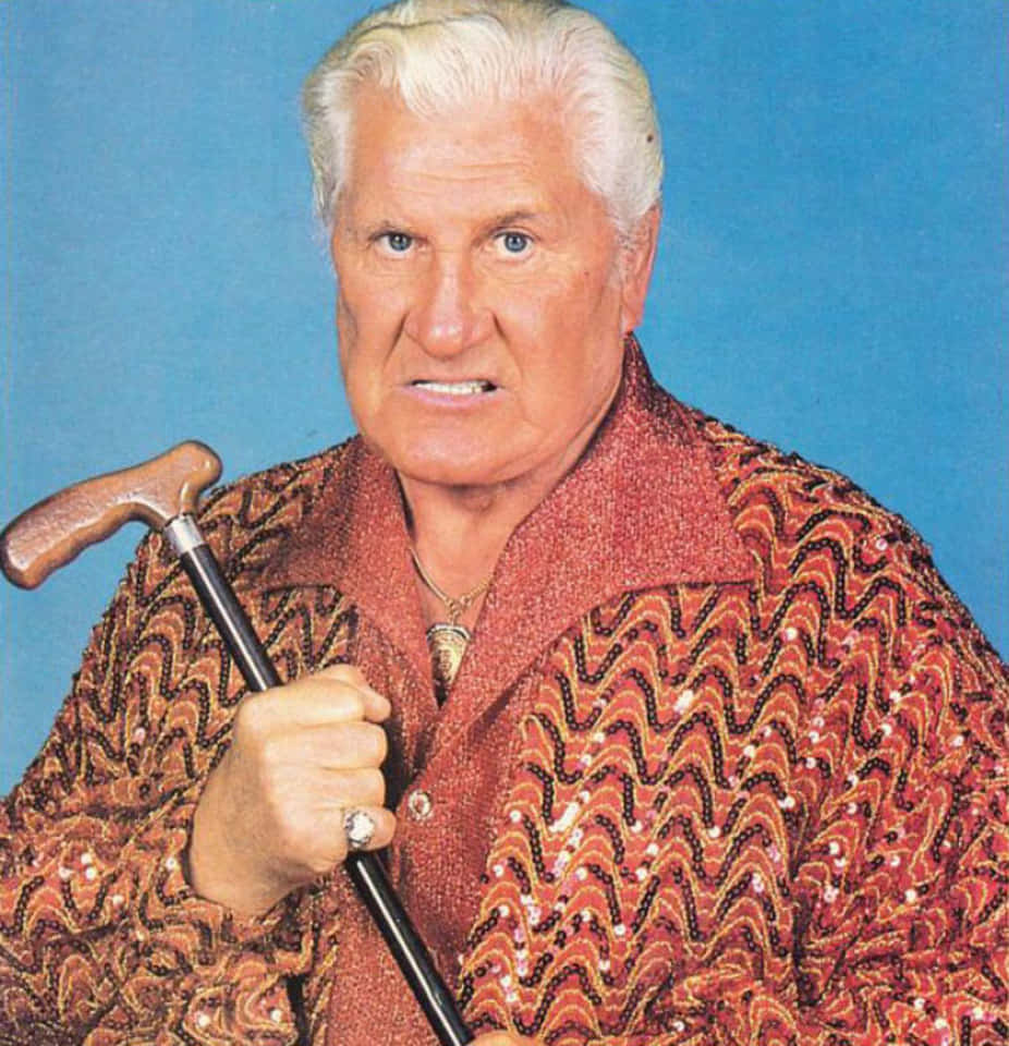 Freddie Blassie, sequined red patterned jacket, wooden cane, SD Phone Wallpaper