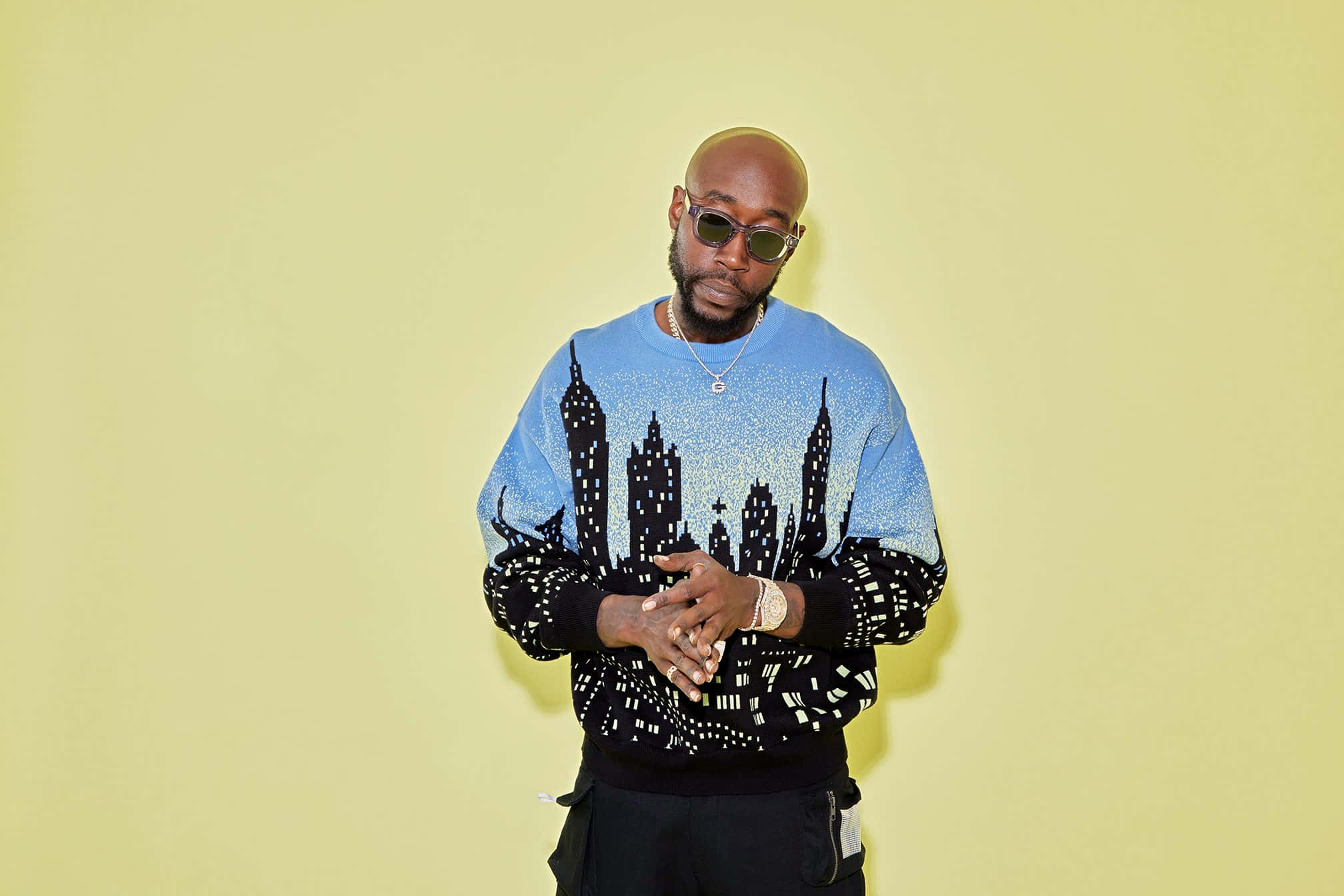 Freddie Gibbs, yellow backdrop, blue sweater, Full HD Desktop Wallpaper