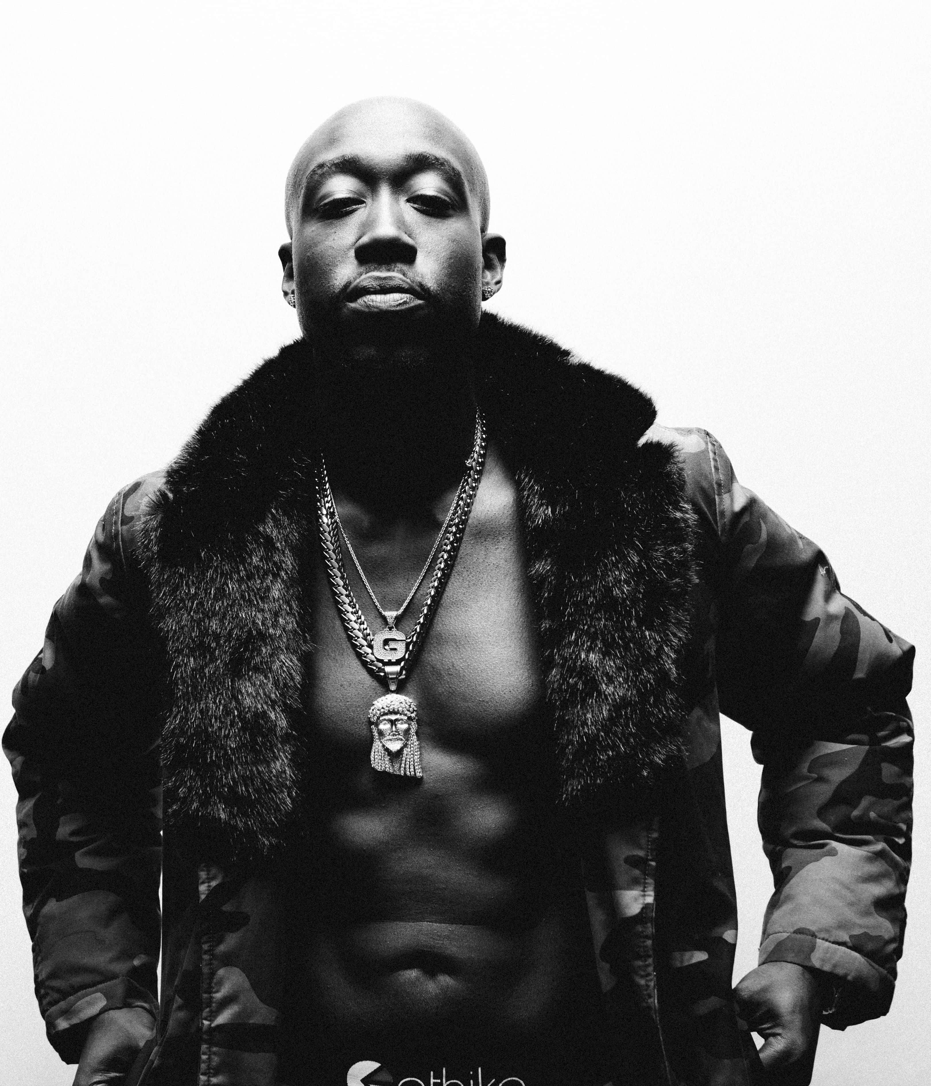 Freddie Gibbs, bald man with a beard, fur-lined camouflage jacket, 2K Phone Wallpaper