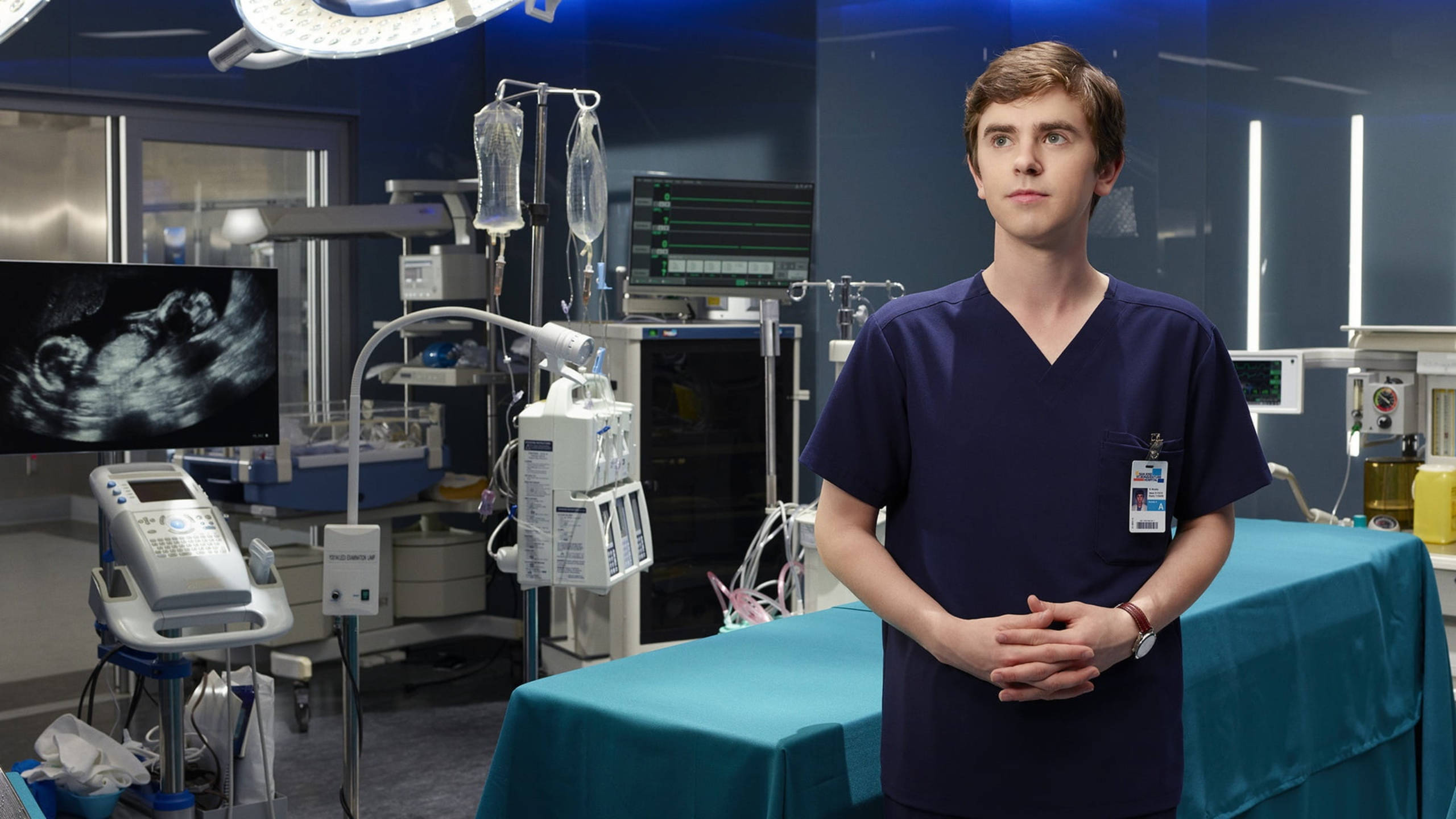 Freddie Highmore, operating room, navy scrubs, 2K Desktop Wallpaper