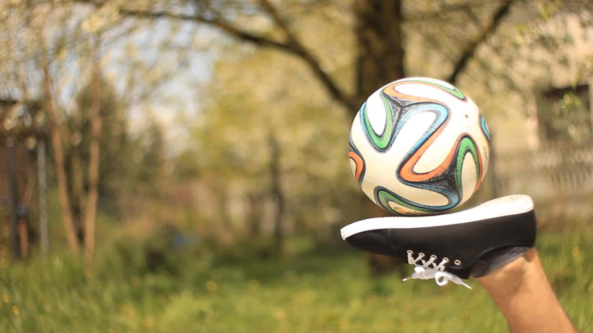 Freestyle Soccer Ball, black sneaker, blurred green park backdrop, Full HD Desktop Wallpaper