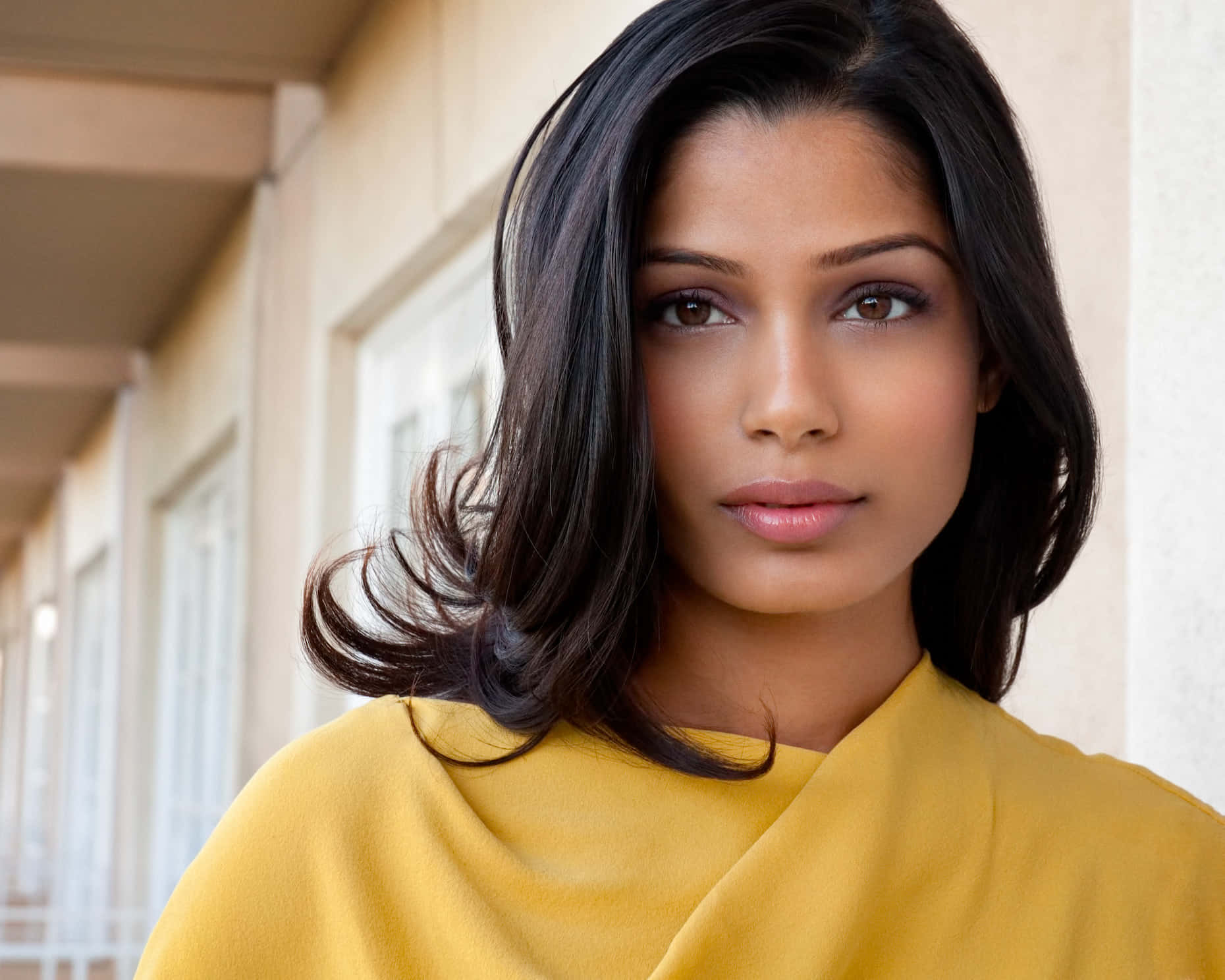 Freida Pinto, yellow top, sunlit building facade, HD Desktop Wallpaper