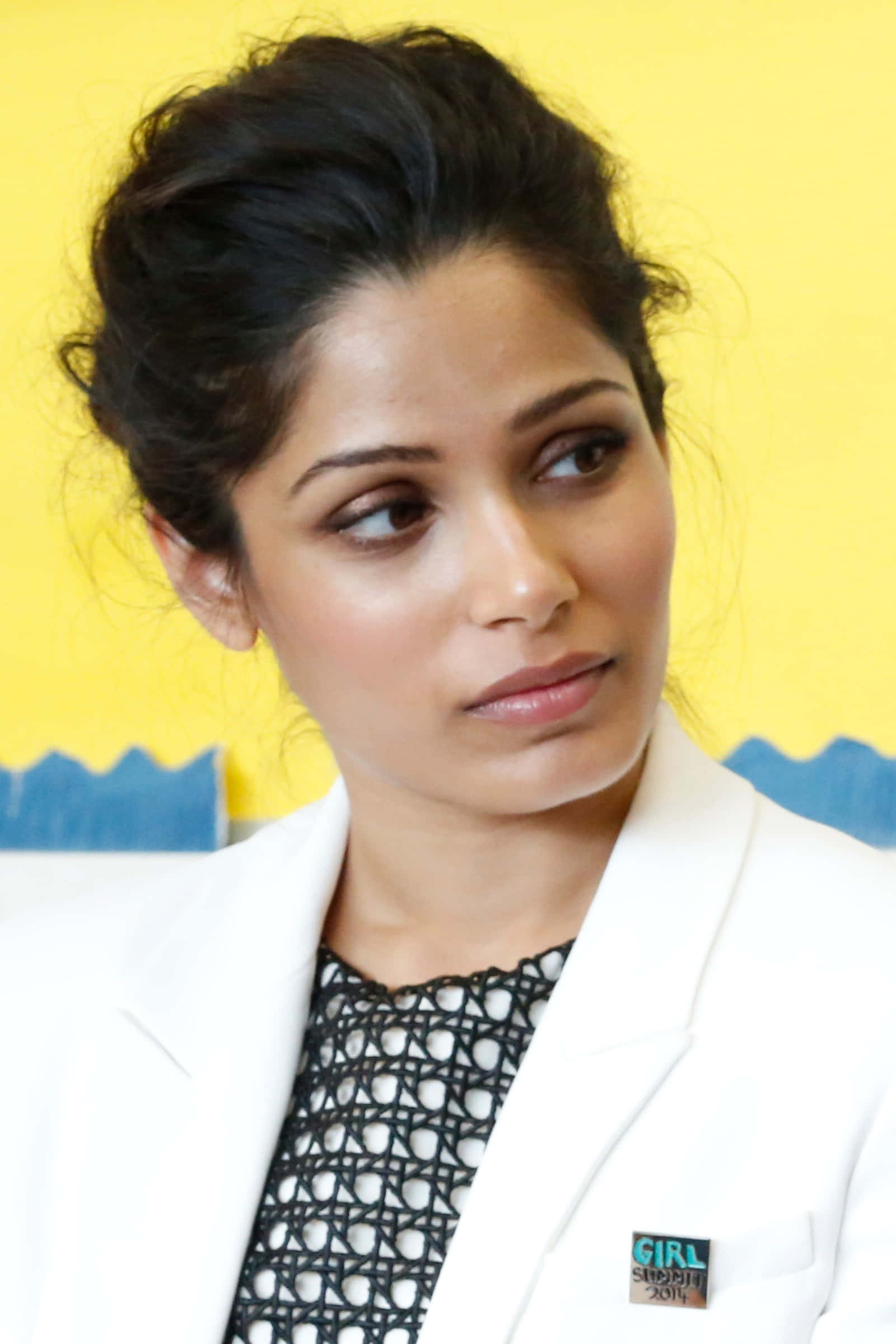 Freida Pinto, white blazer, bright yellow wall, Full HD Phone Wallpaper