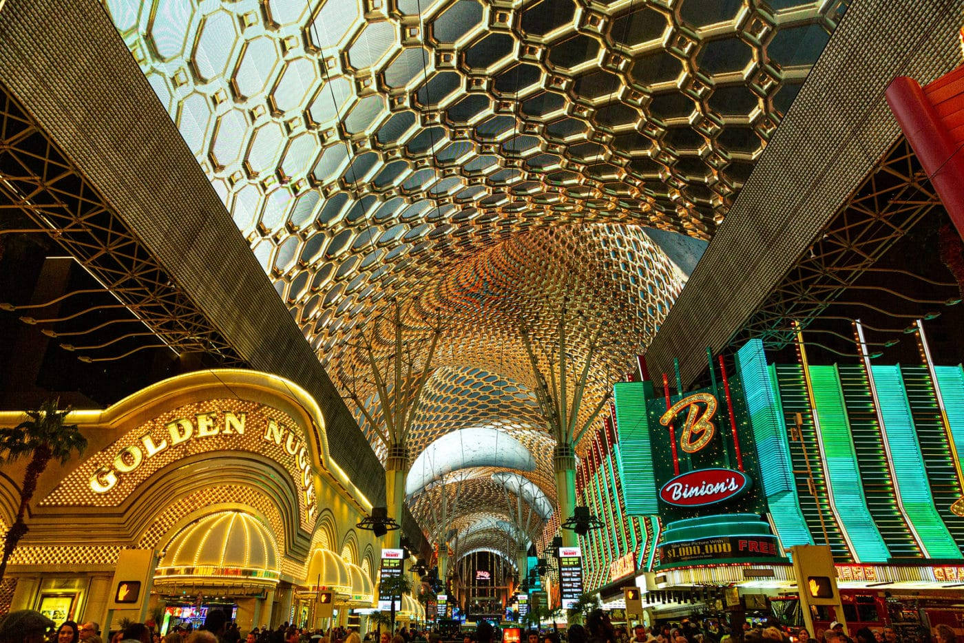 Fremont Street, neon-lit casino corridor, golden honeycomb ceiling, HD Desktop Wallpaper