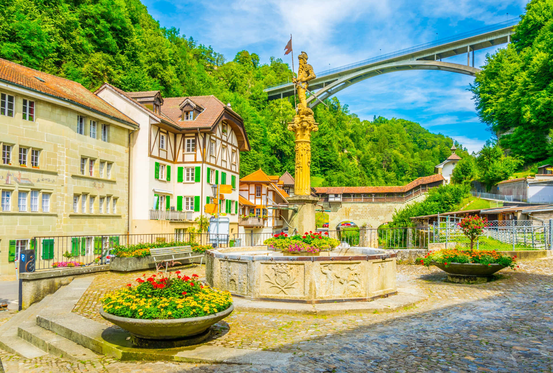 Fribourg, golden statue fountain, colorful flowerbeds, Full HD Desktop Wallpaper