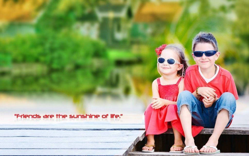 two young siblings, sunglasses, wooden dock, SD Desktop Wallpaper