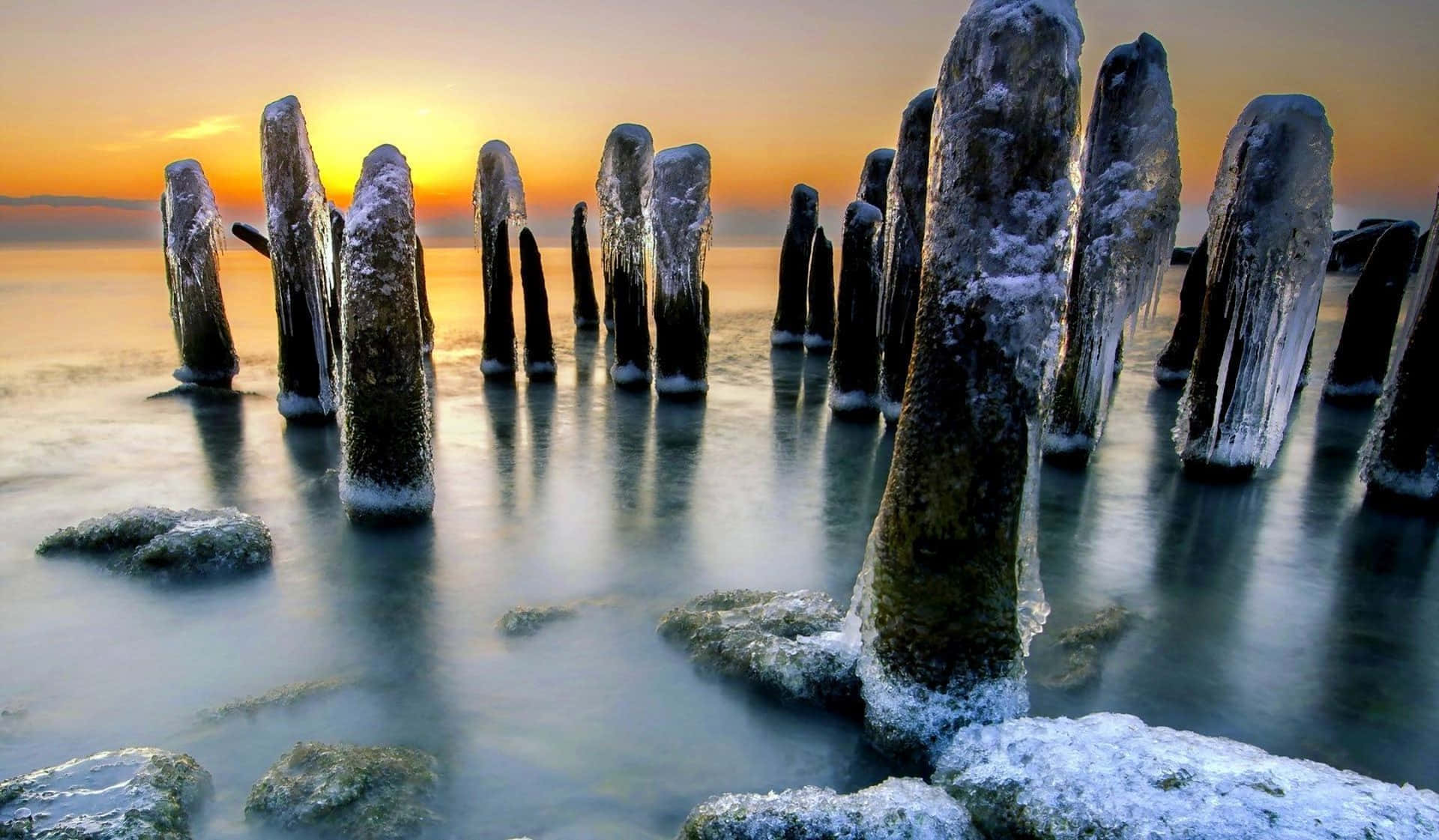 frozen lake, wooden pilings, icy water, Full HD Desktop Wallpaper
